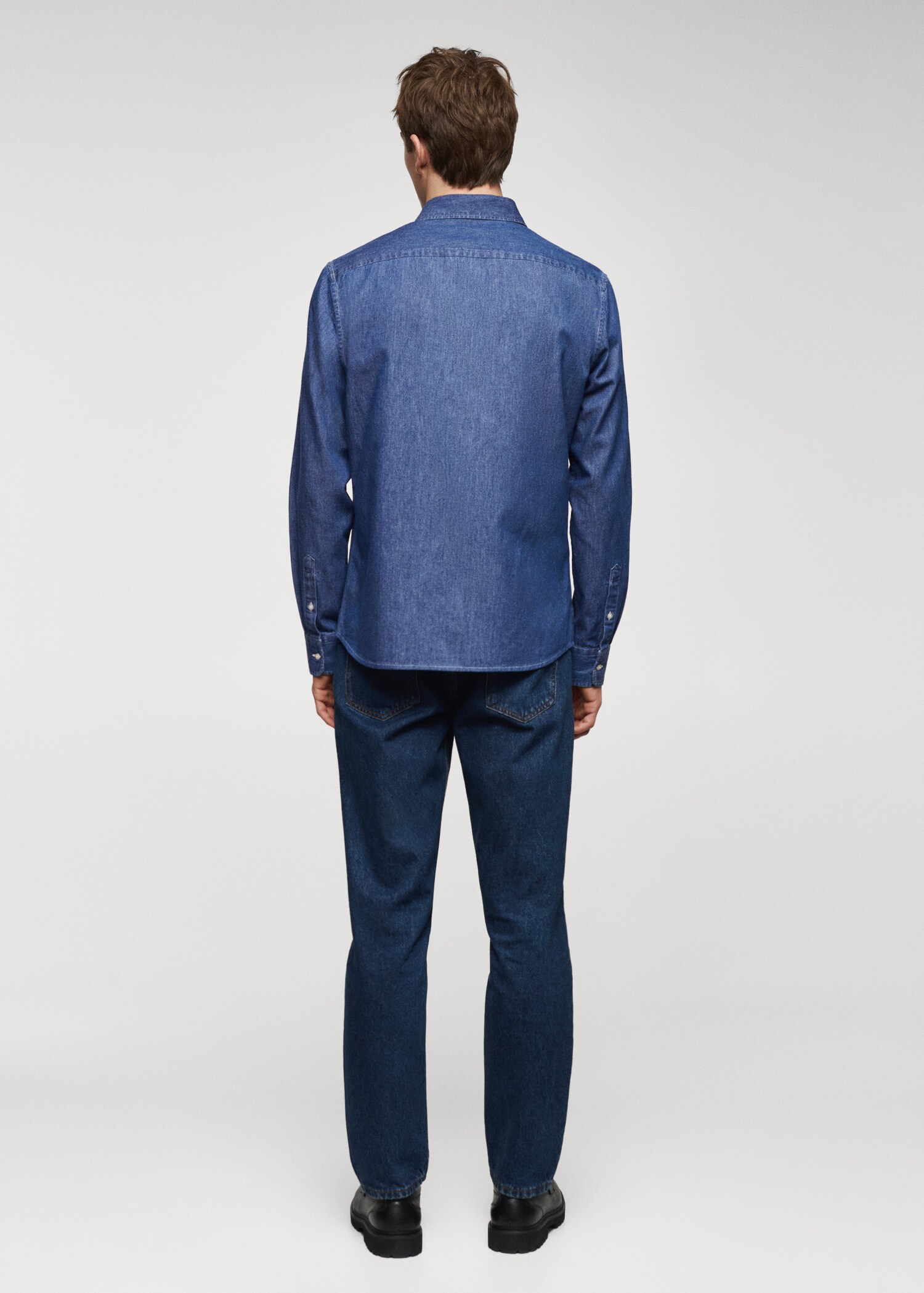 Denim overshirt with pockets - Reverse of the article
