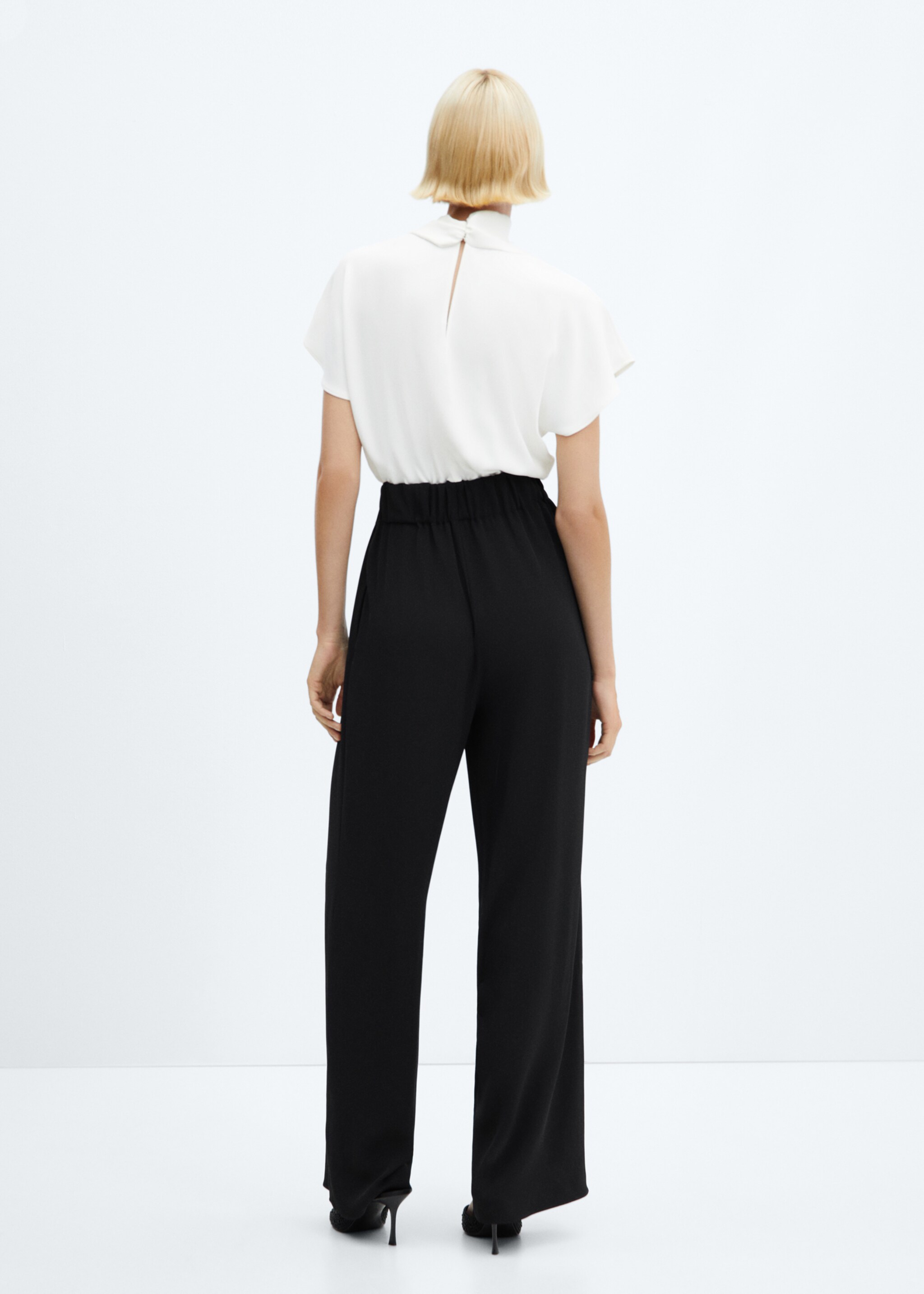 Cross-neck long jumpsuit - Reverse of the article
