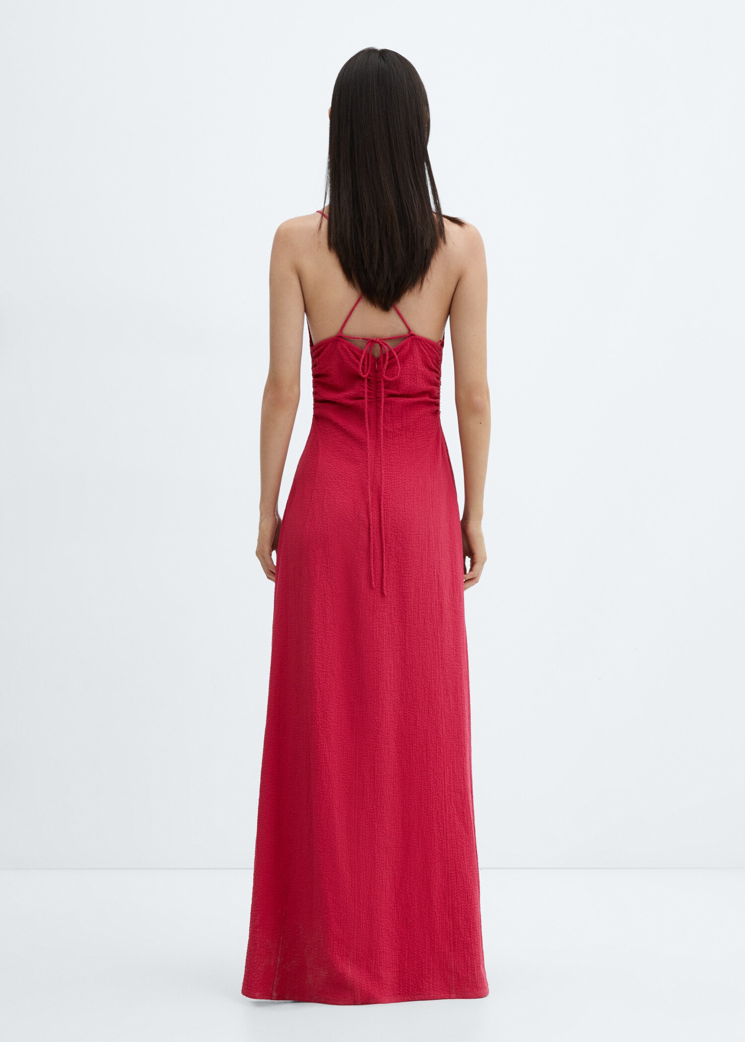Textured dress with opening - Reverse of the article