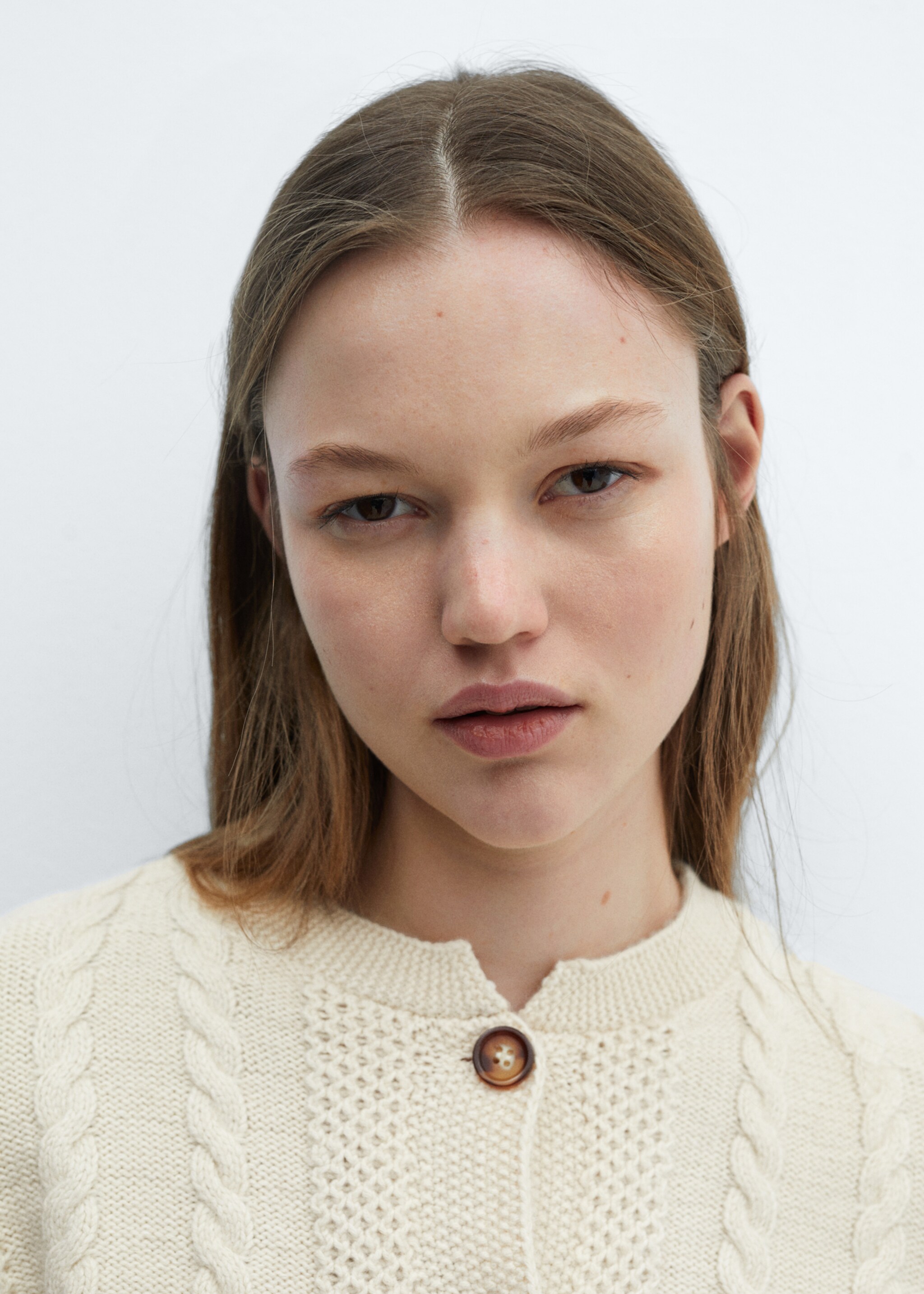 Buttoned knit braided cardigan - Details of the article 1, Ecru. Ref: 67084056-00.