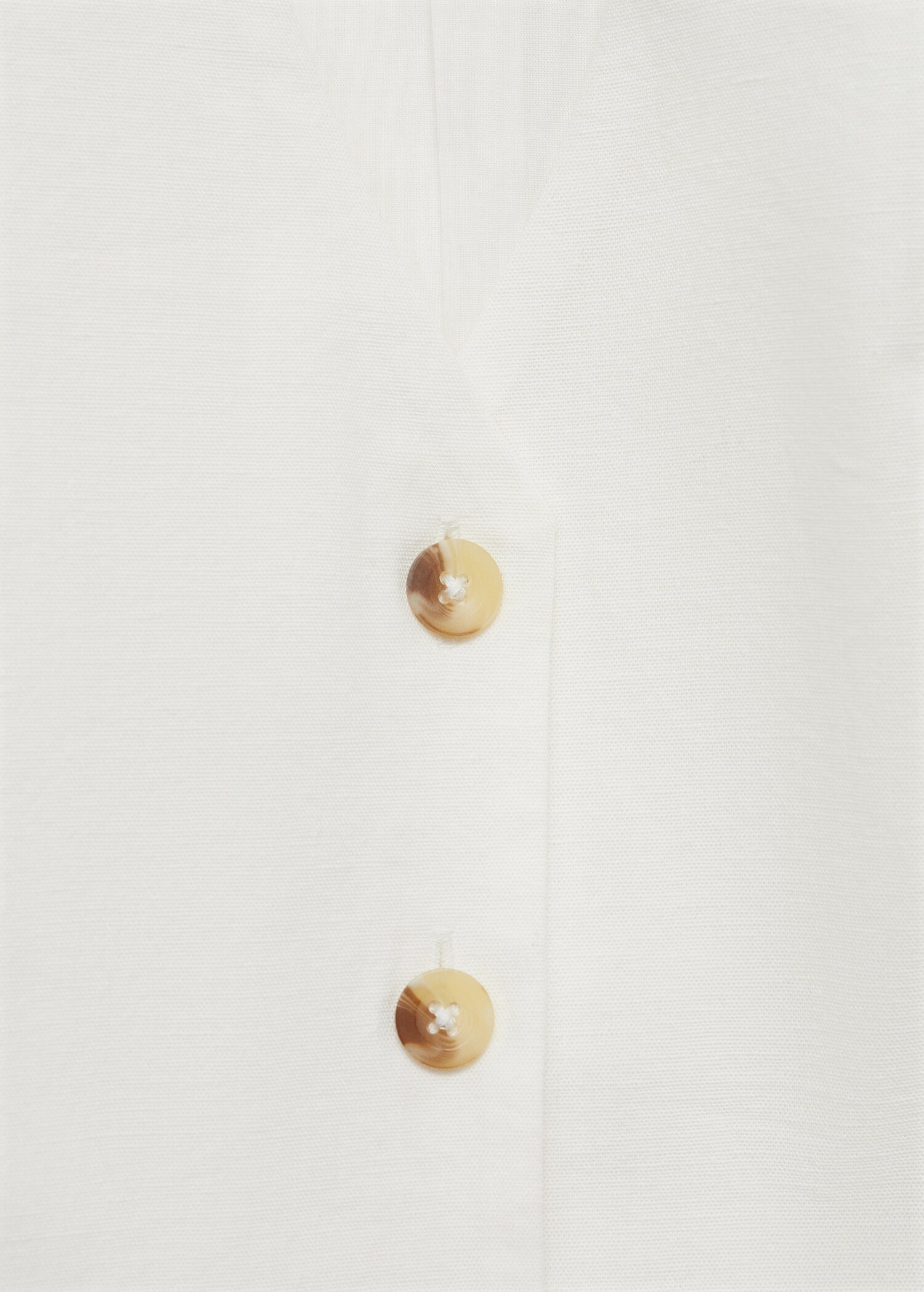 Armilla lli botons - Detall de l'article 8