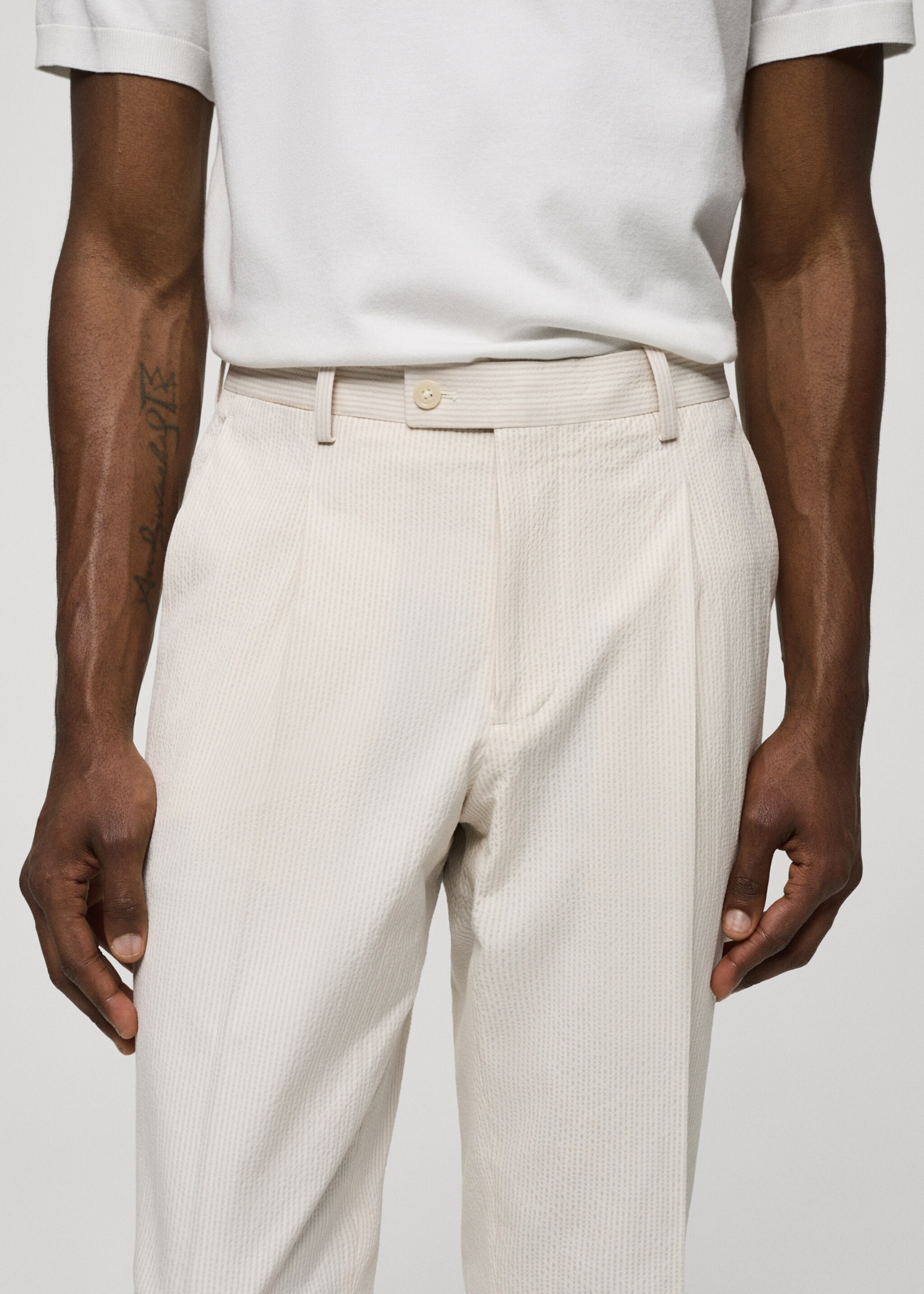 Striped seersucker cotton slim-fit suit trousers - Details of the article 1