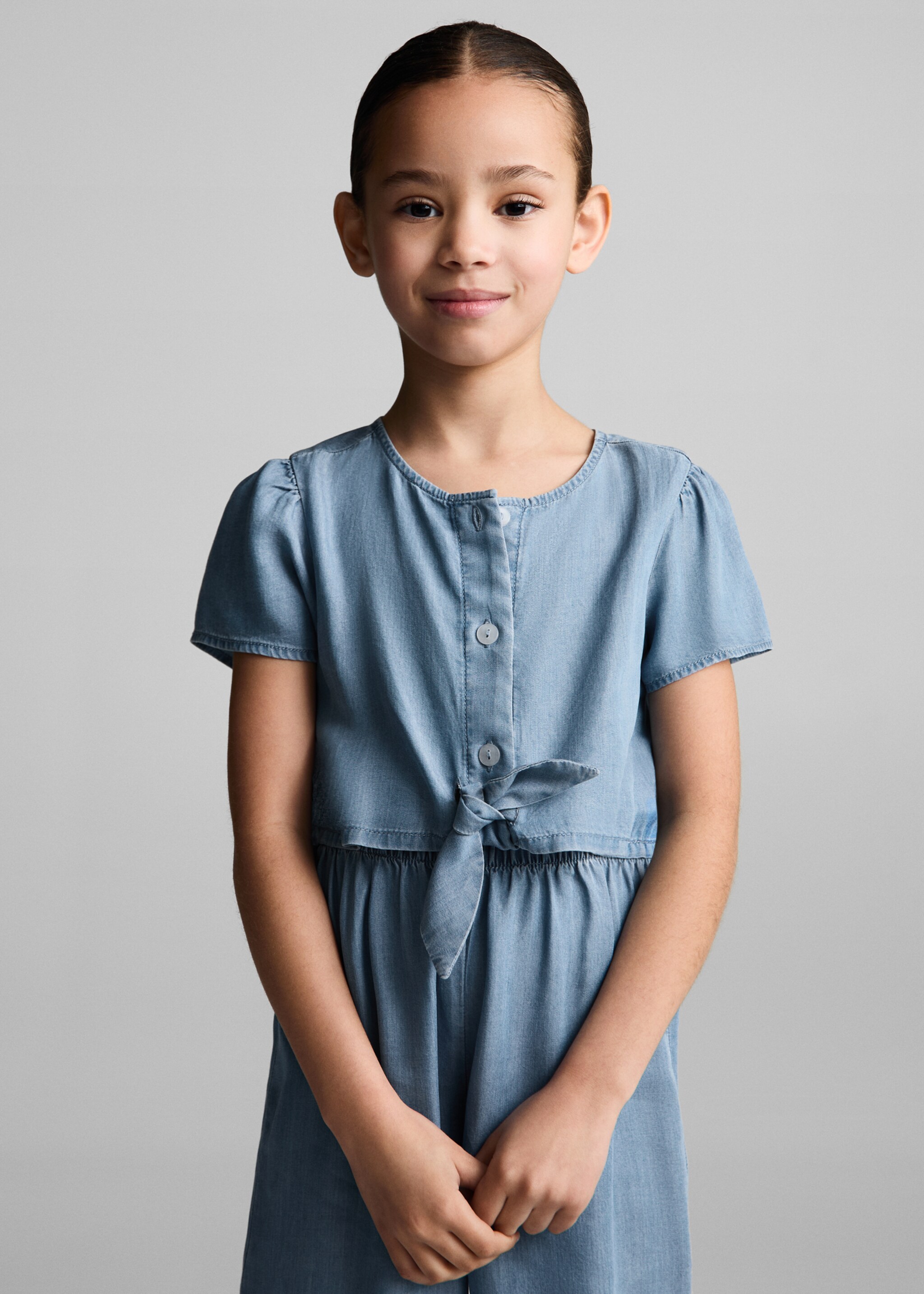 Jumpsuit lang i denim - Halvtotal bildeutsnitt