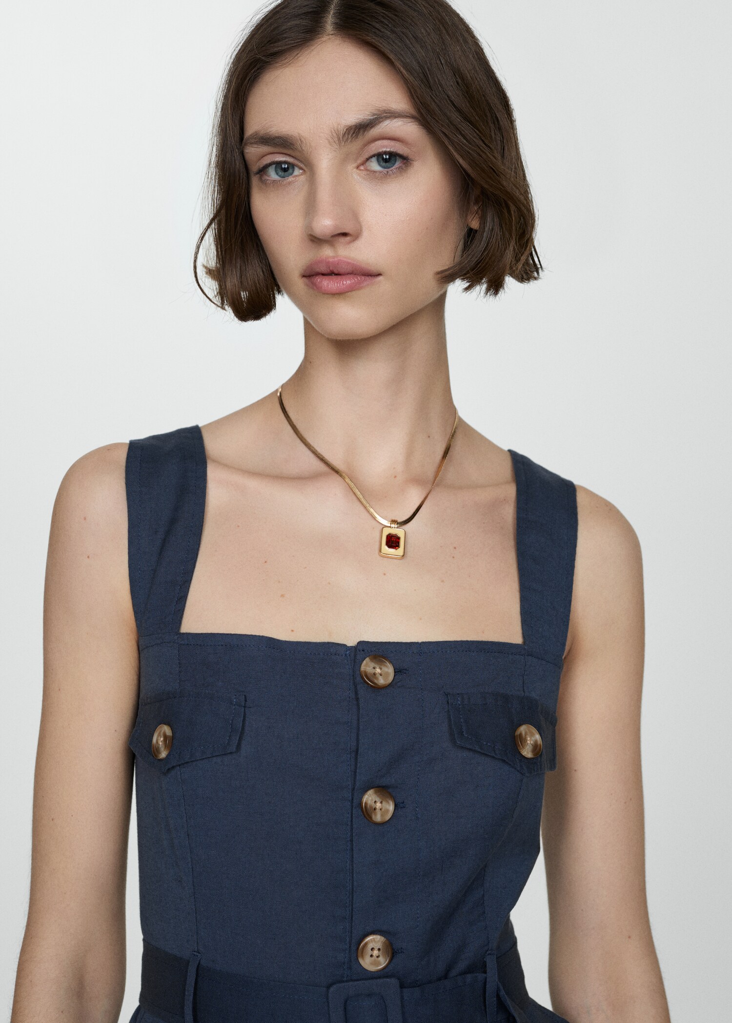Short jumpsuit with buttons - Details of the article 1