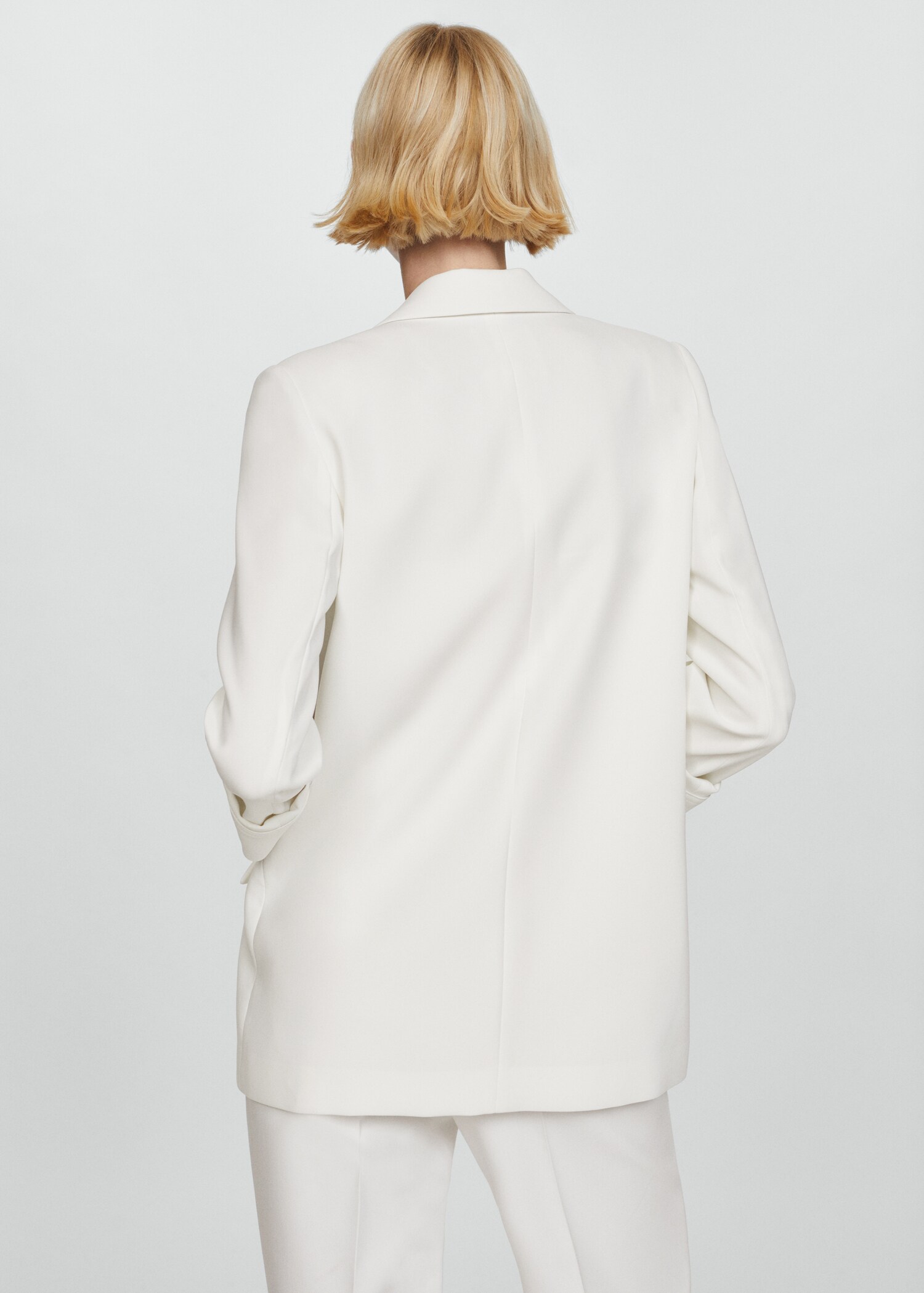 Tailored jacket with turn-down sleeves - Reverse of the article