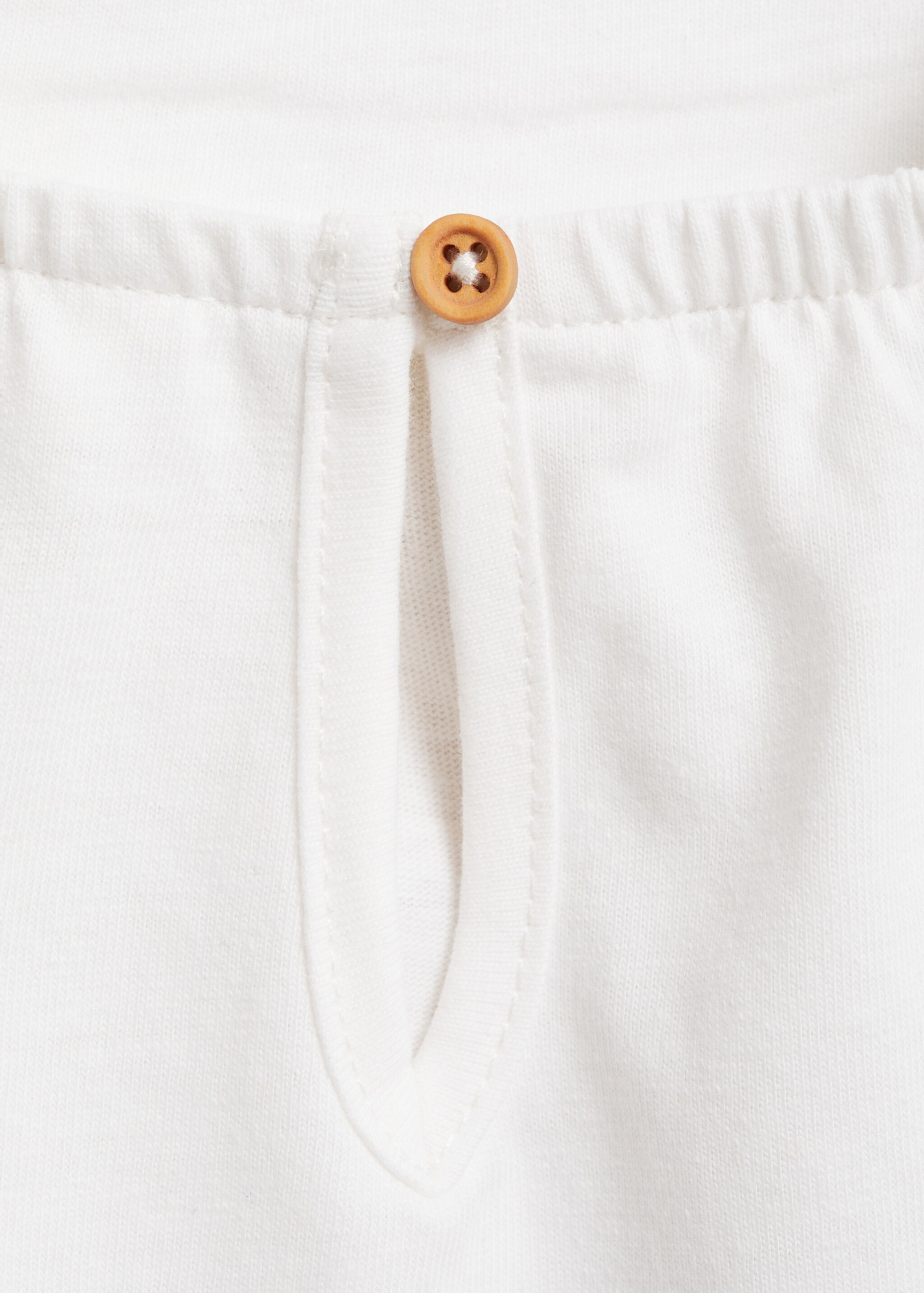 Vestido com folhos e bordado suíço - Pormenor do artigo 0