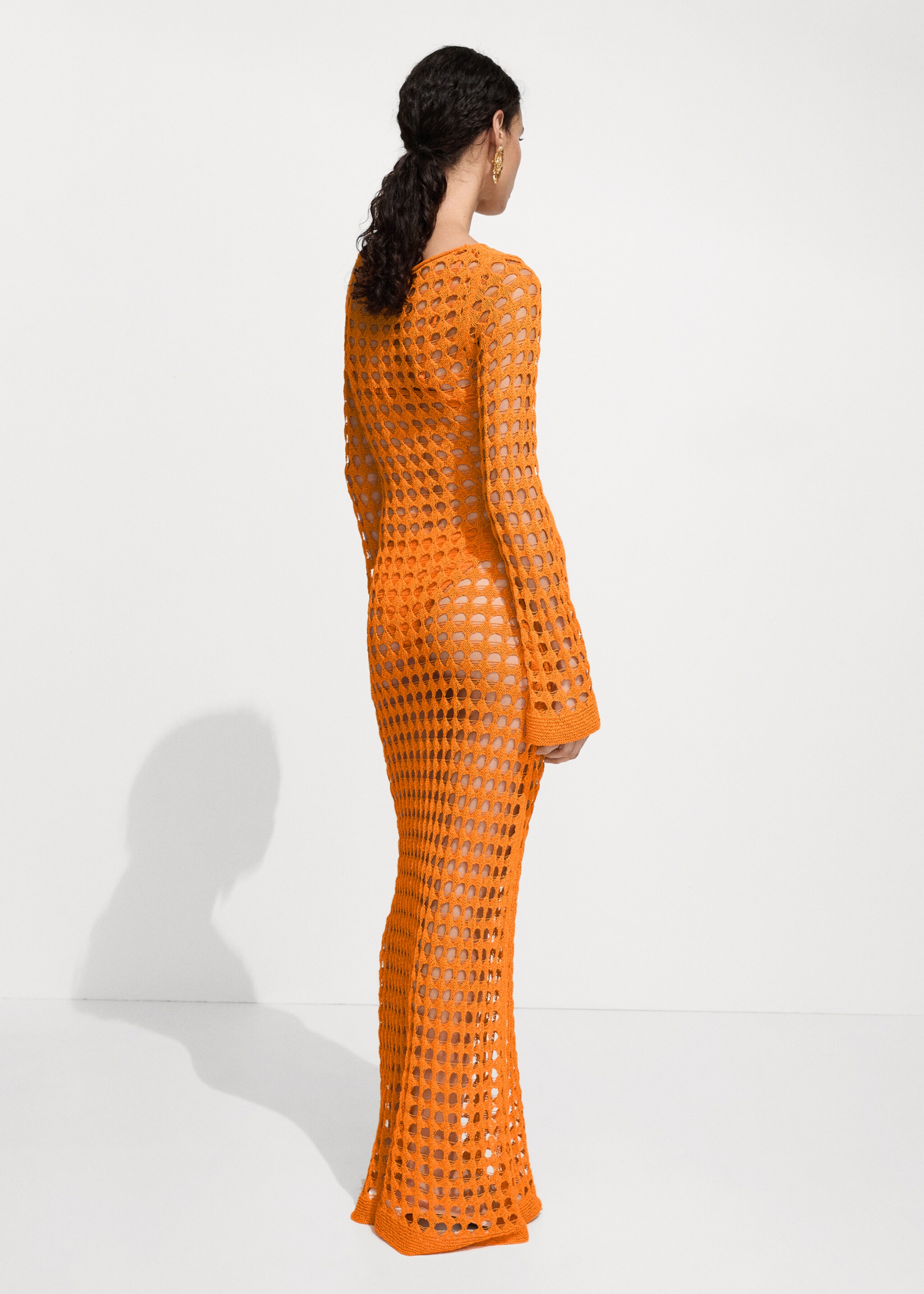 Long openwork knitted dress - Reverse of the article