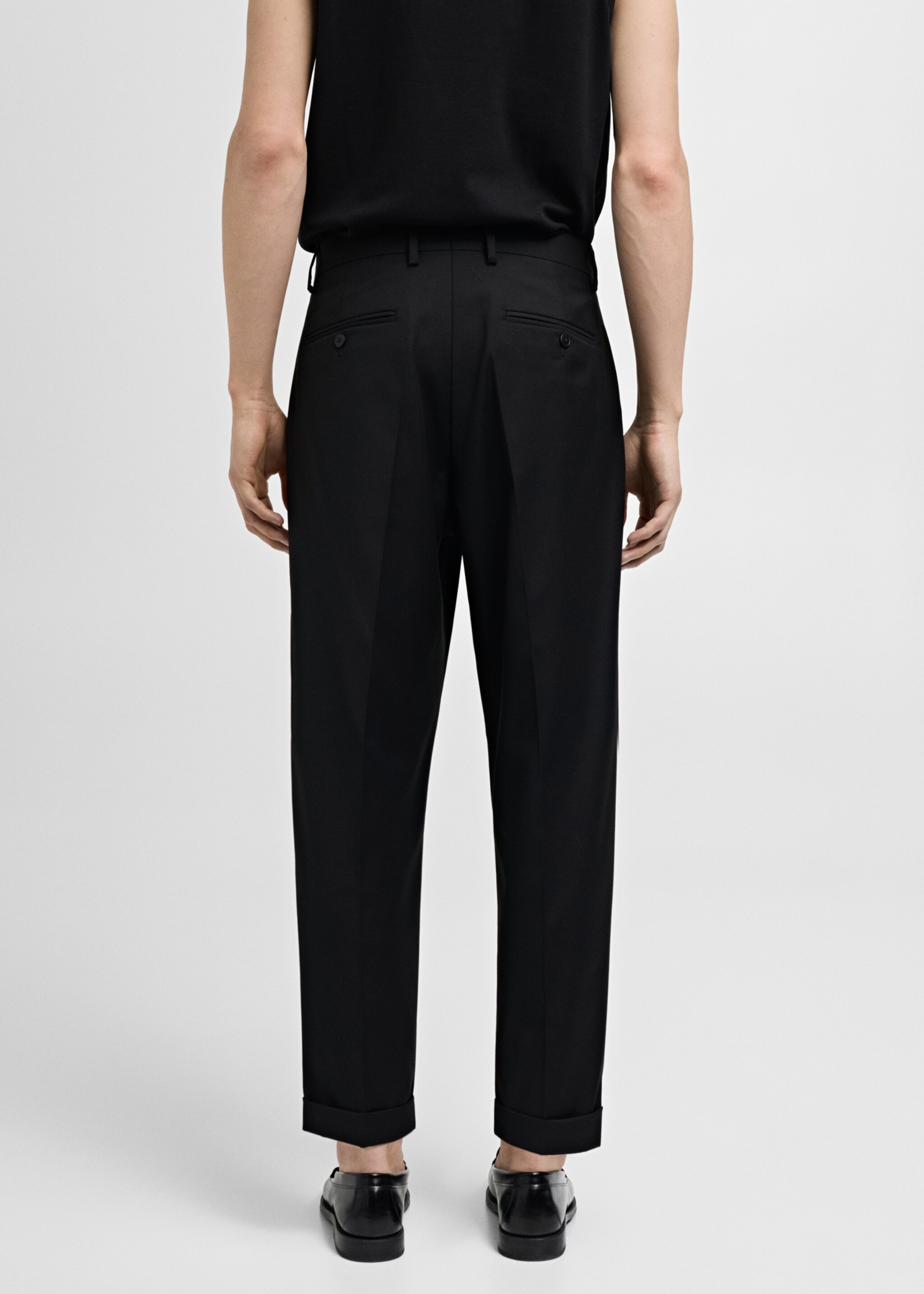 Pantalon de costume regular fit - Verso de l’article, Noir. Ref: 77000584-00.