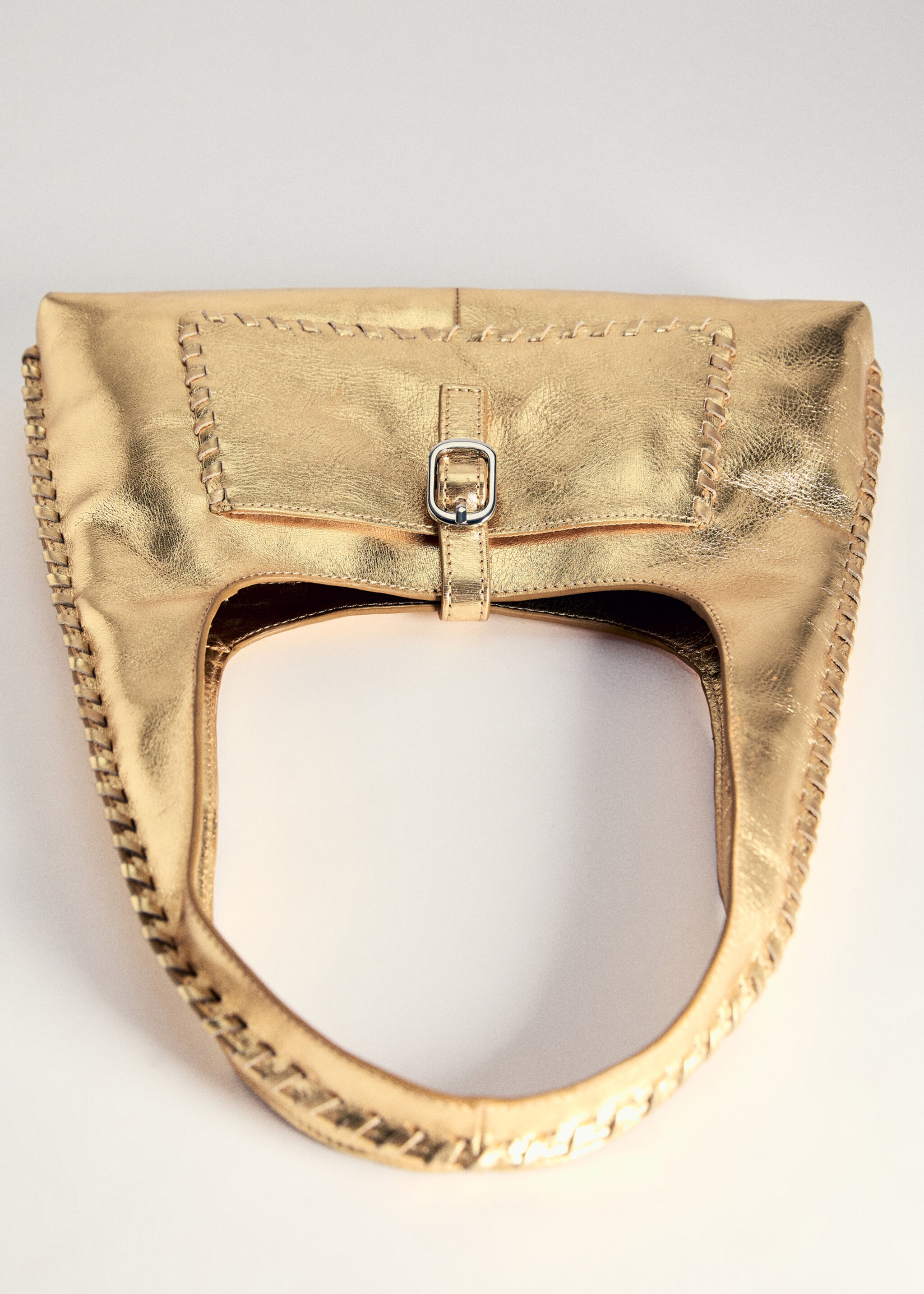 Bossa pell metal·litzada - Detall de l'article 5, Daurat. Ref: 77002013-00.