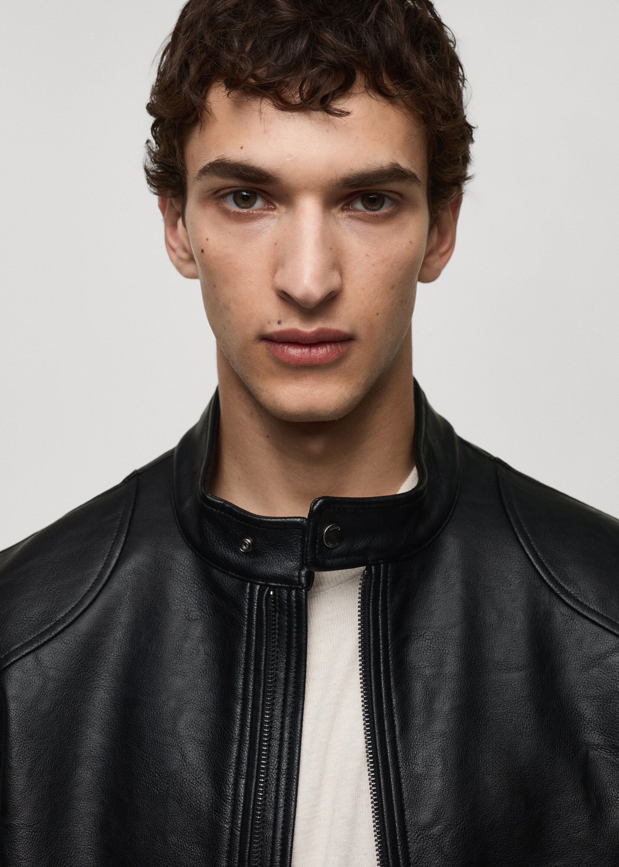 Zip-up leather-effect jacket - Details of the article 1, Black. Ref: 77004442-00.