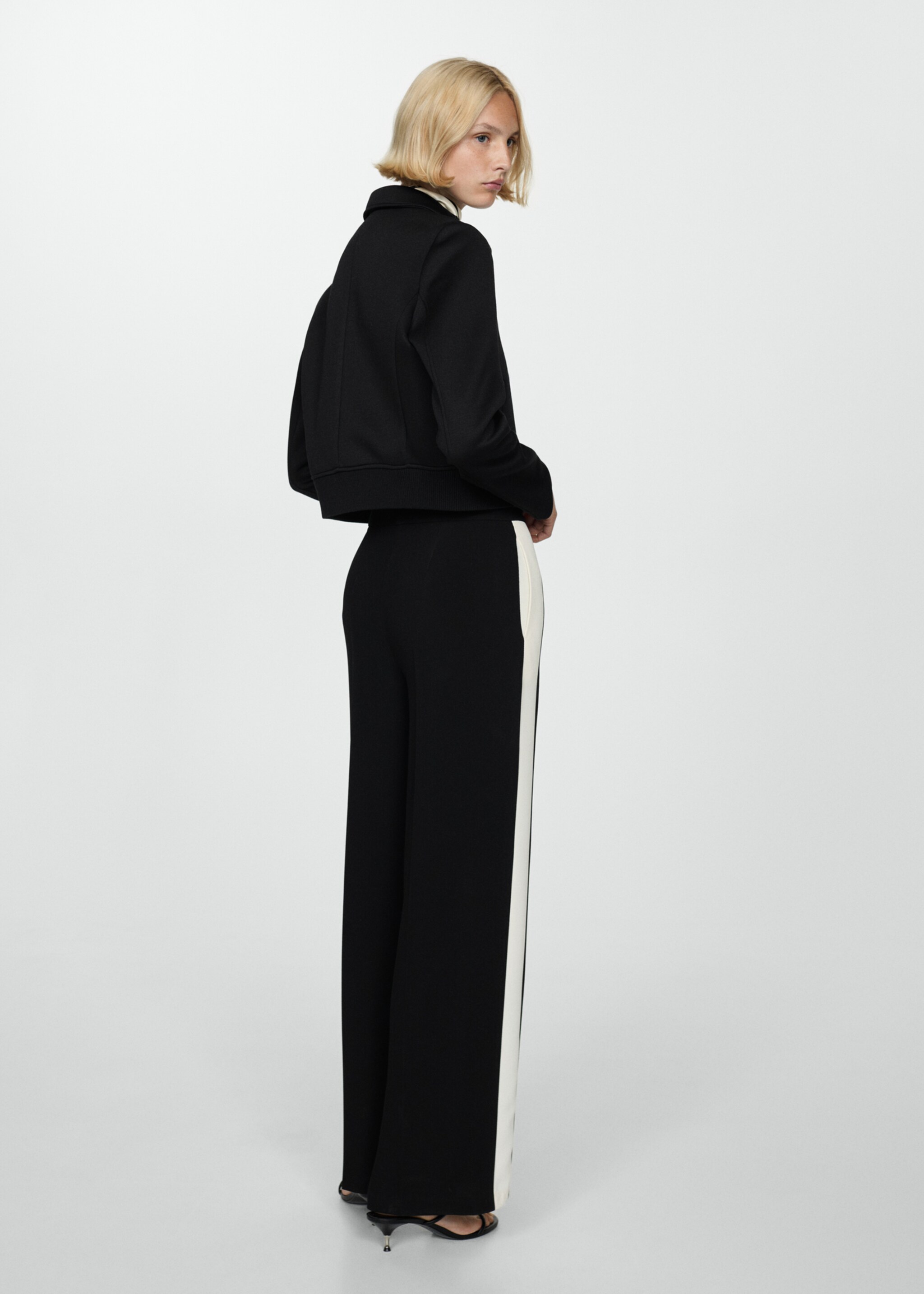 Striped trousers with contrasting sides - Reverse of the article, Black. Ref: 77004797-00.