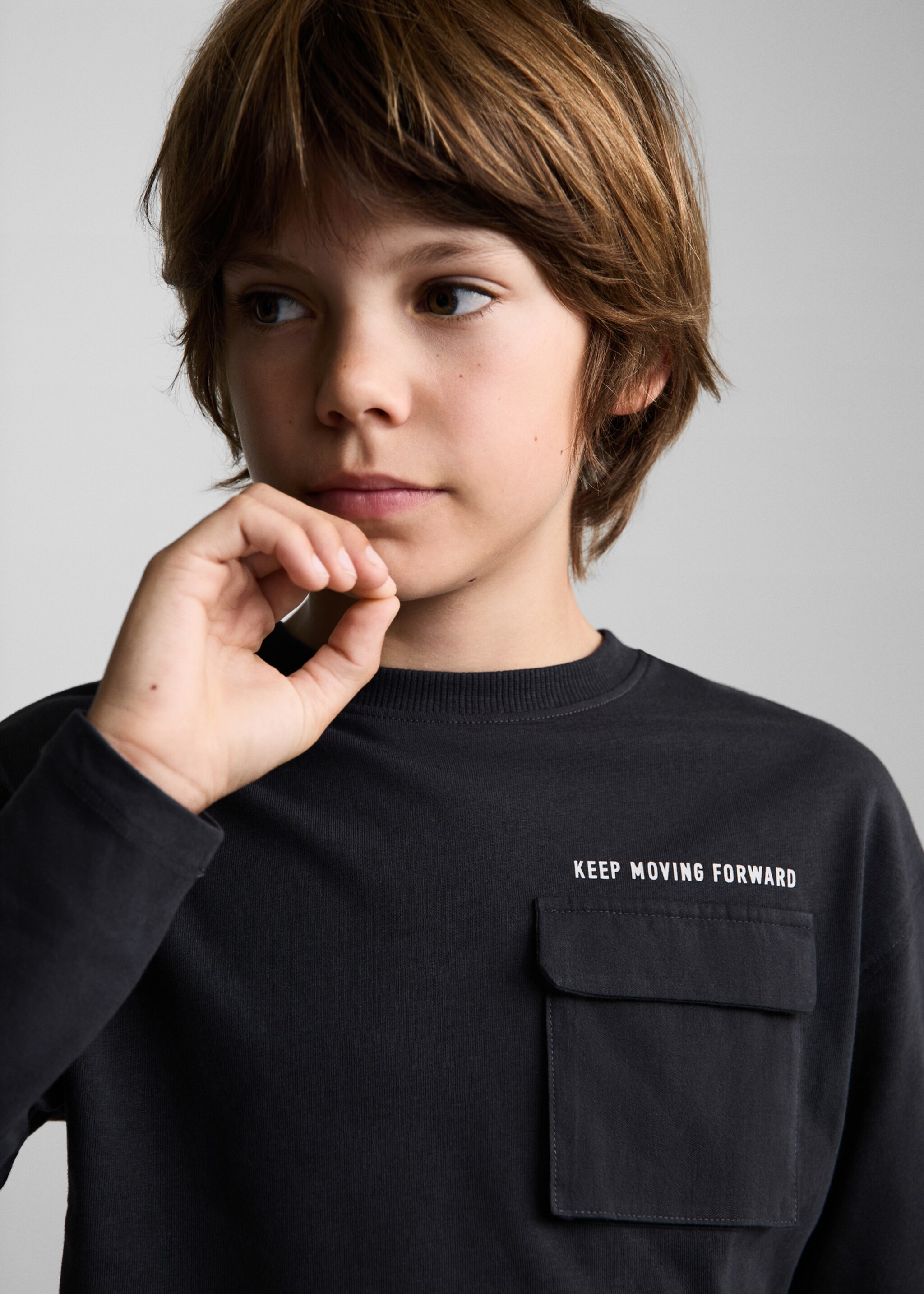 T-shirt manches longues poches - Détail de l'article 1, Noir. Ref: 77006725-00.