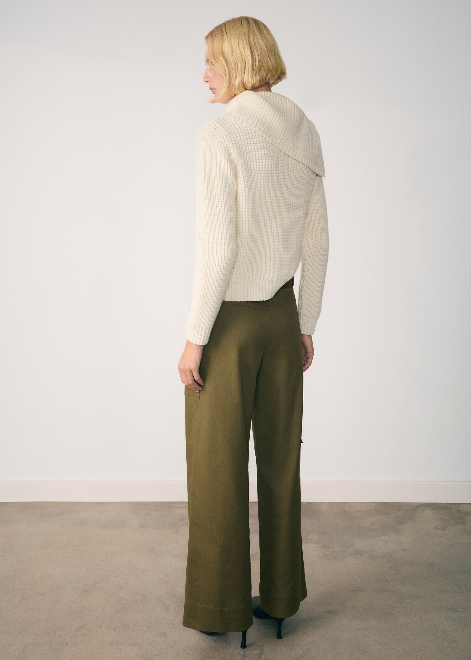 Funnel-neck sweater with buttons - Reverse of the article