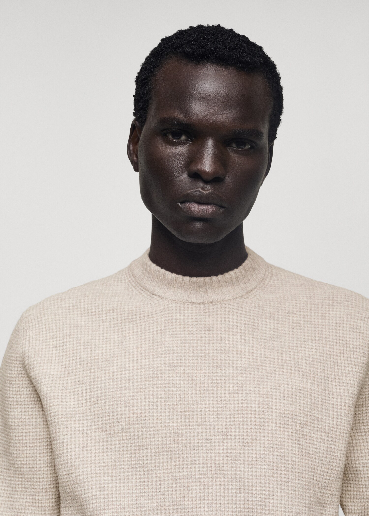 Knitted sweater with check structure - Details of the article 1