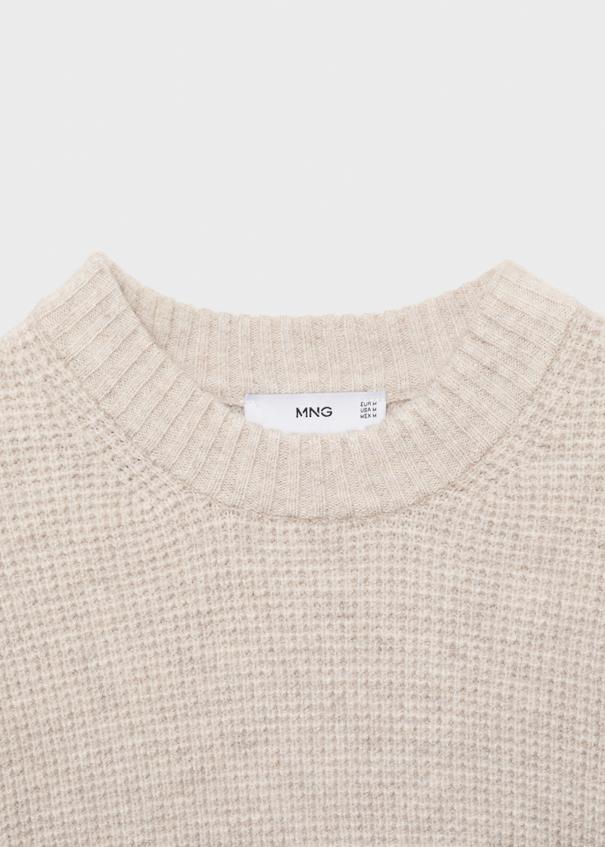 Knitted sweater with check structure - Details of the article 8, Sand. Ref: 77007950-00.
