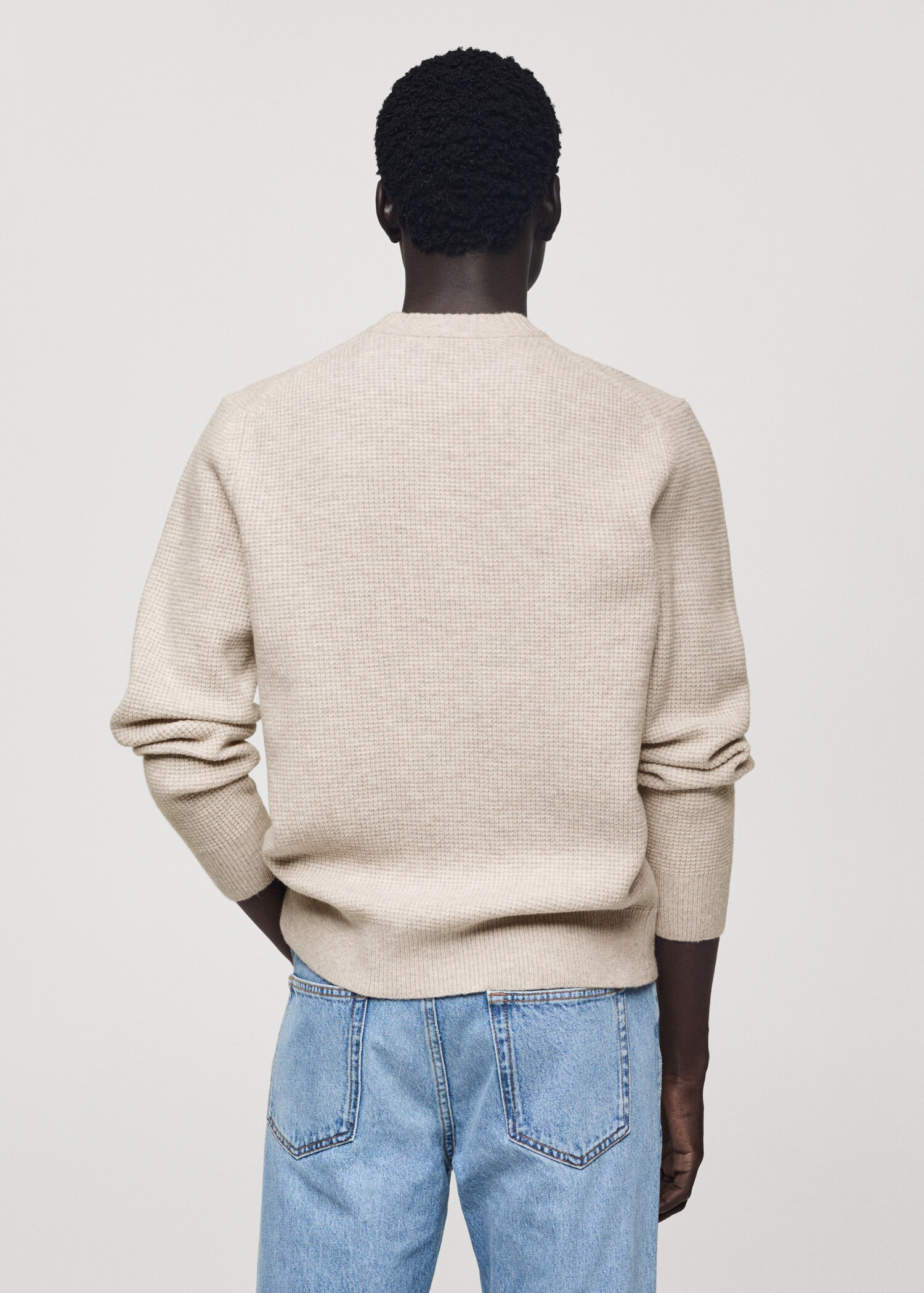 Knitted sweater with check structure - Reverse of the article