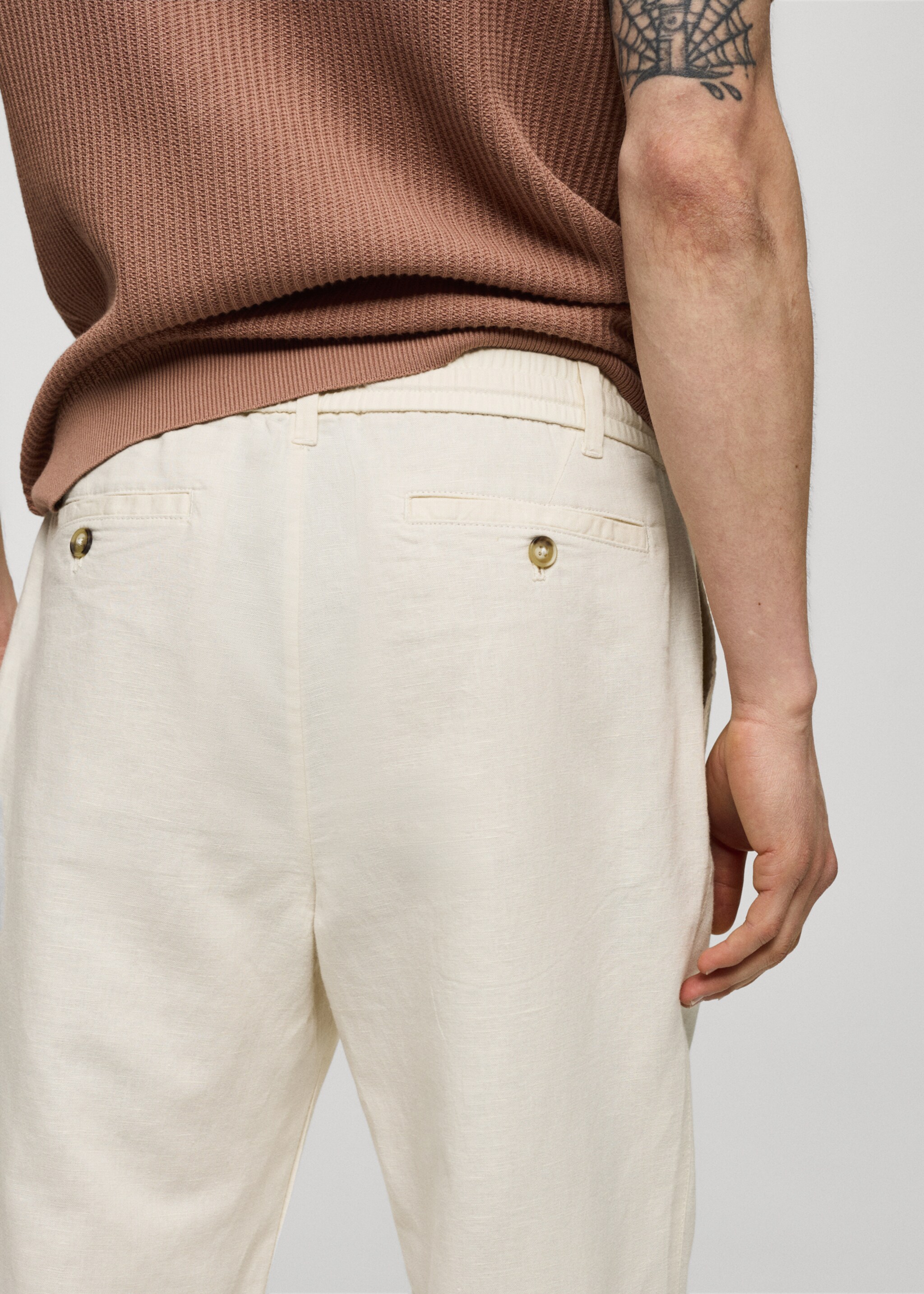 Slim-fit trousers with drawstring - Details of the article 6, Off White. Ref: 77010569-00.