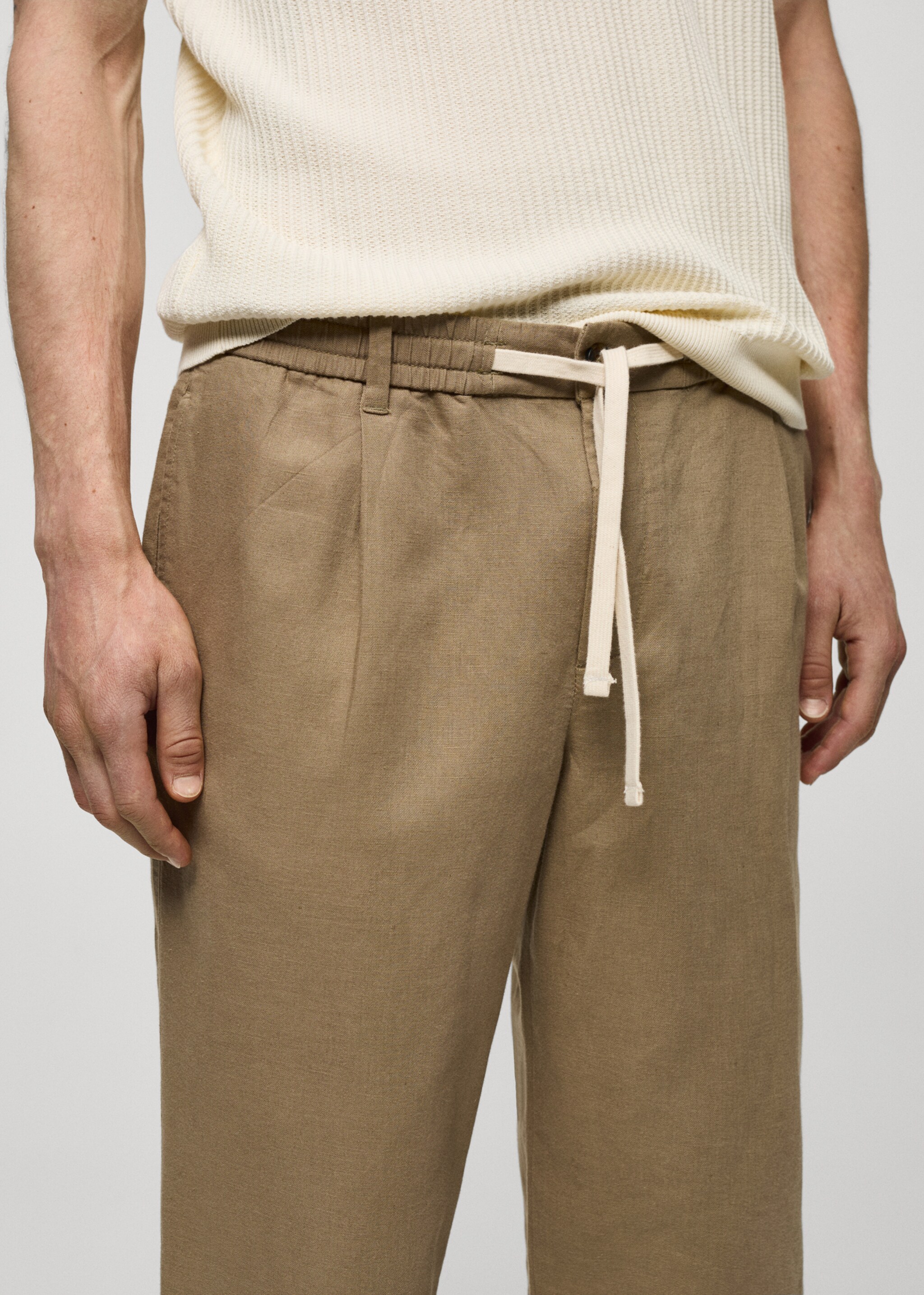 Slim-fit trousers with drawstring - Details of the article 1, Medium Green. Ref: 77010569-00.