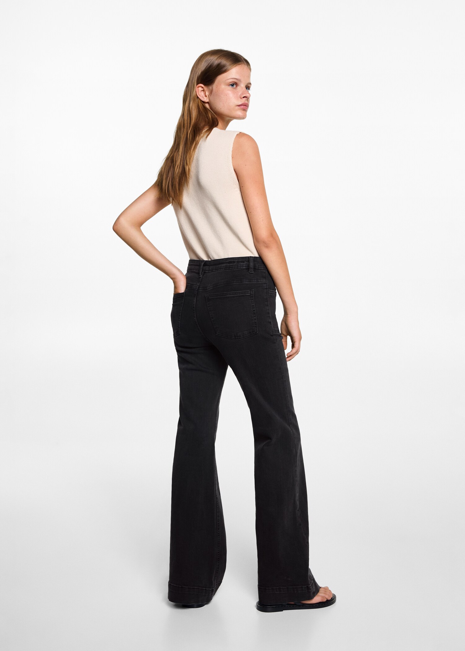 Flared jeans with pocket - Reverse of the article