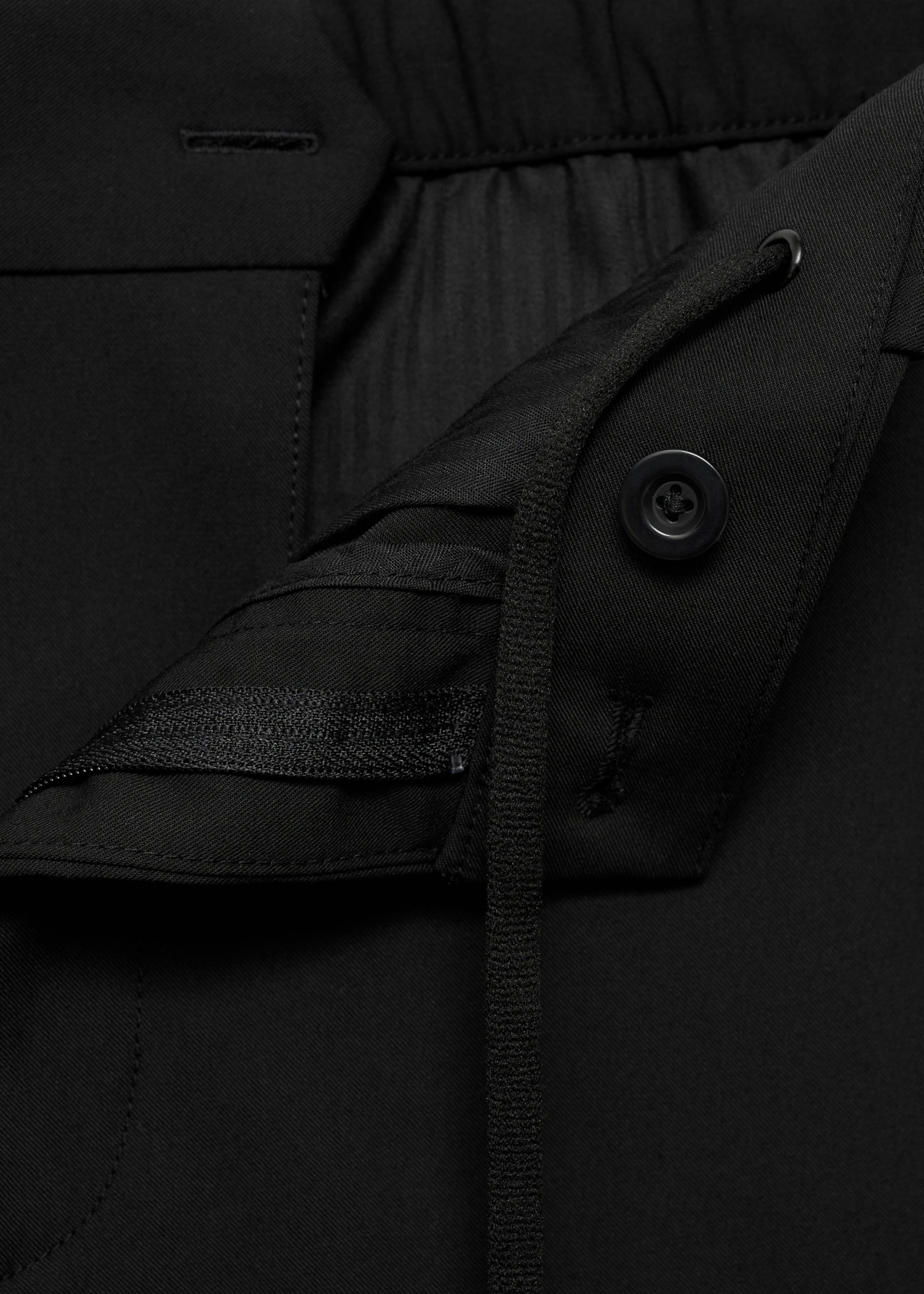 Pantalón slim fit comfort stretch - Detalle del artículo 8, Negro. Ref: 77014436-00.