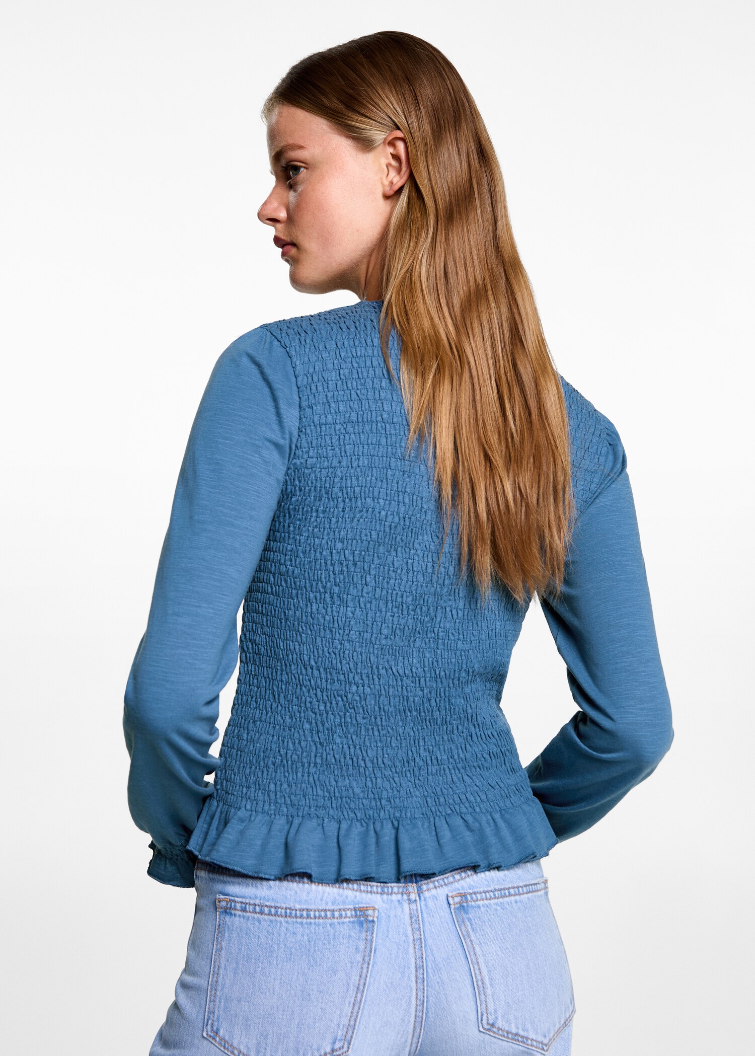 Rynkad detalj blus - Artikelns baksida