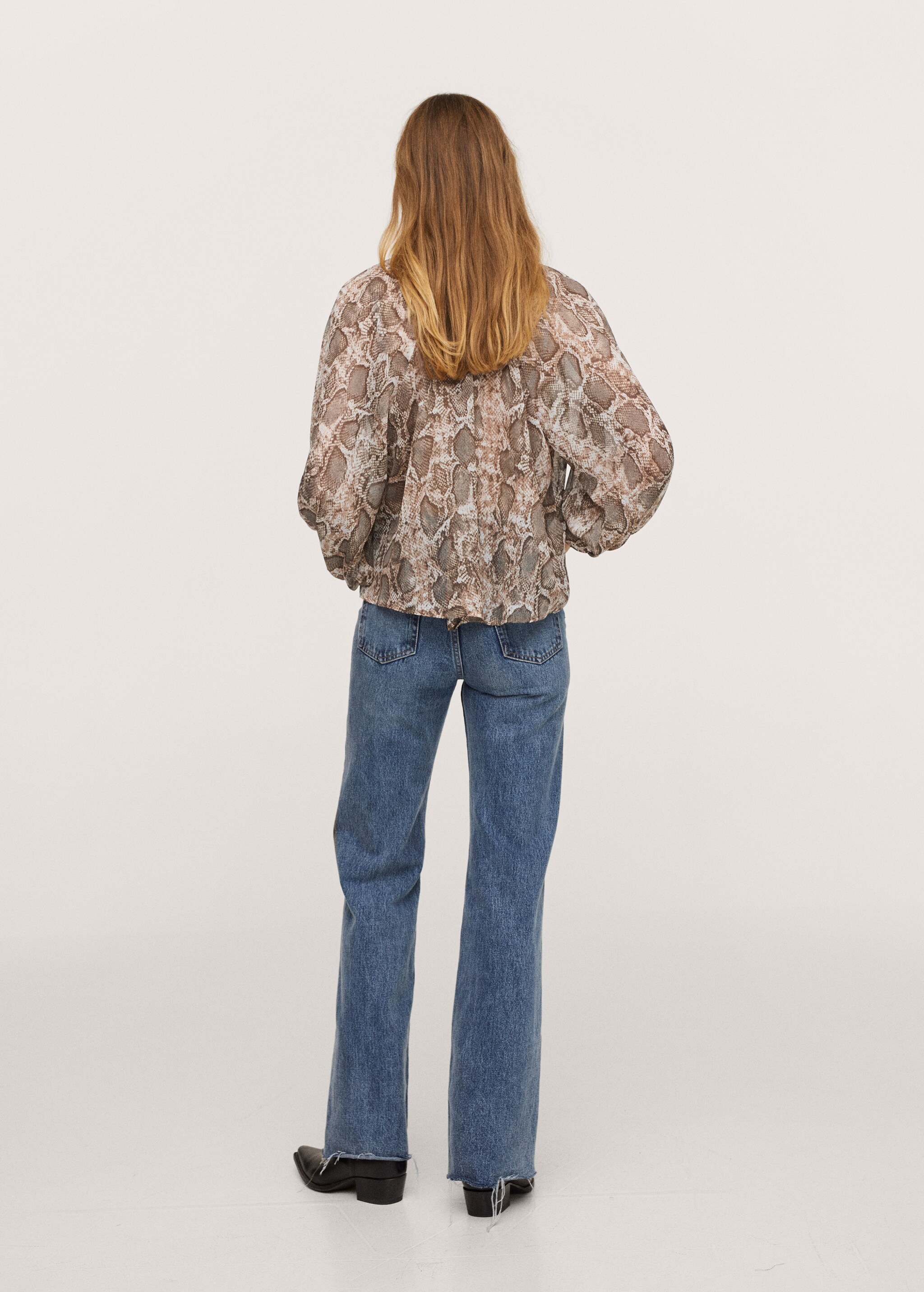 Puffed sleeves blouse - Reverse of the article