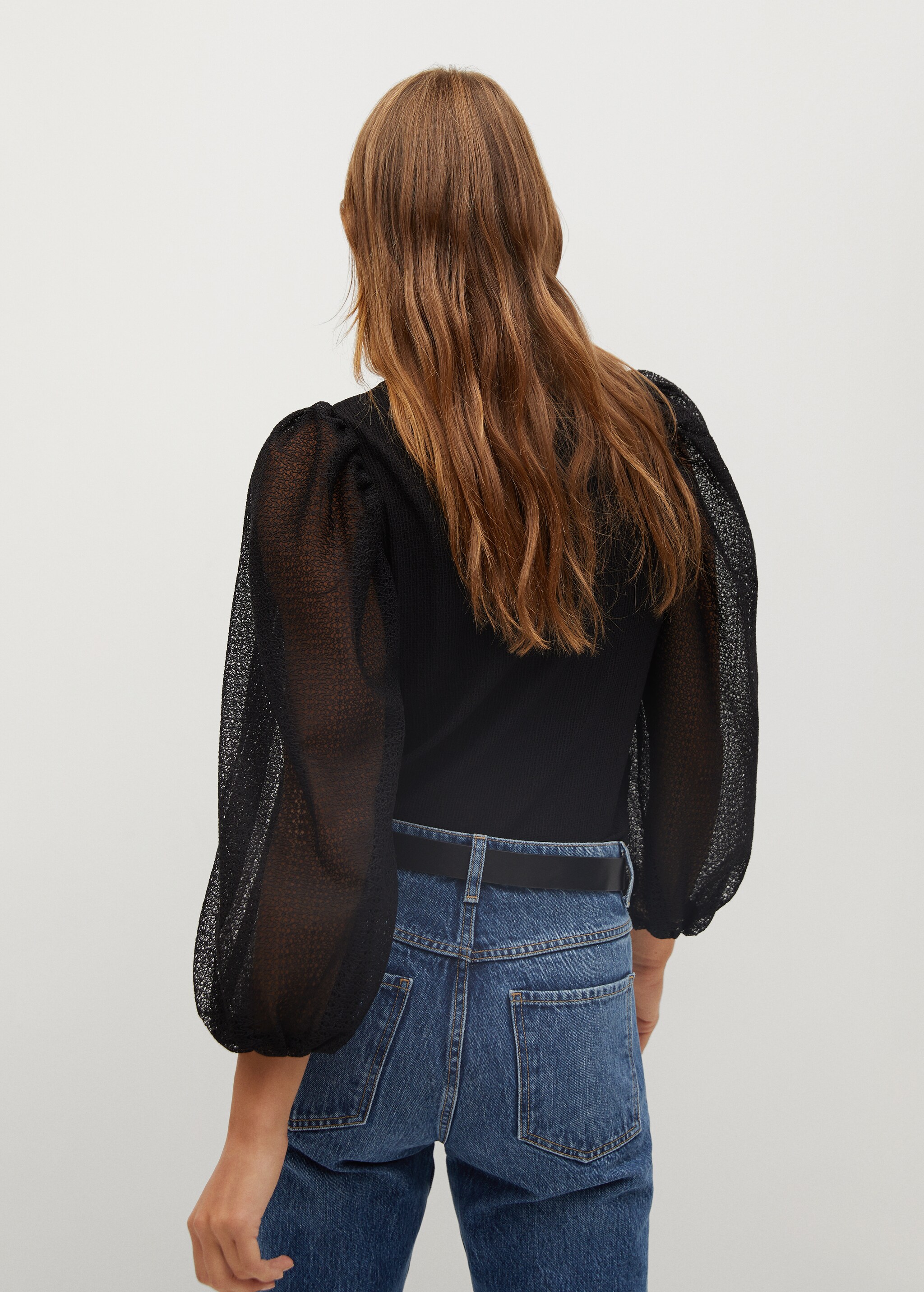 Blusa manga abullonada - Reverso del artículo