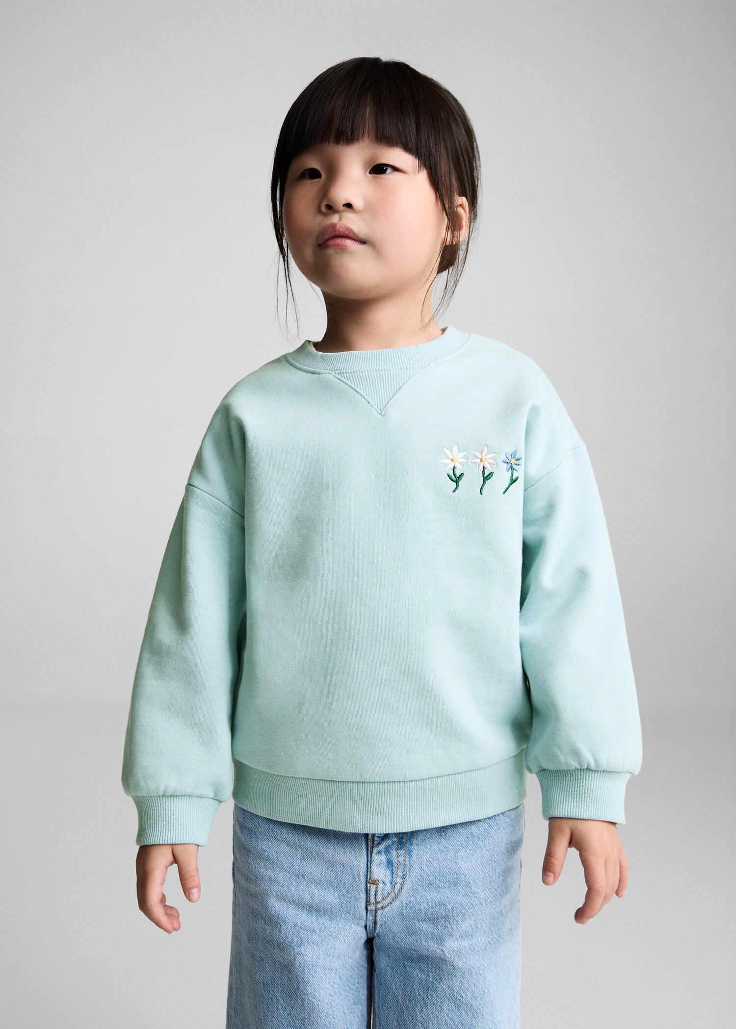Sweatshirt med blombroderi - Bild av mittparti