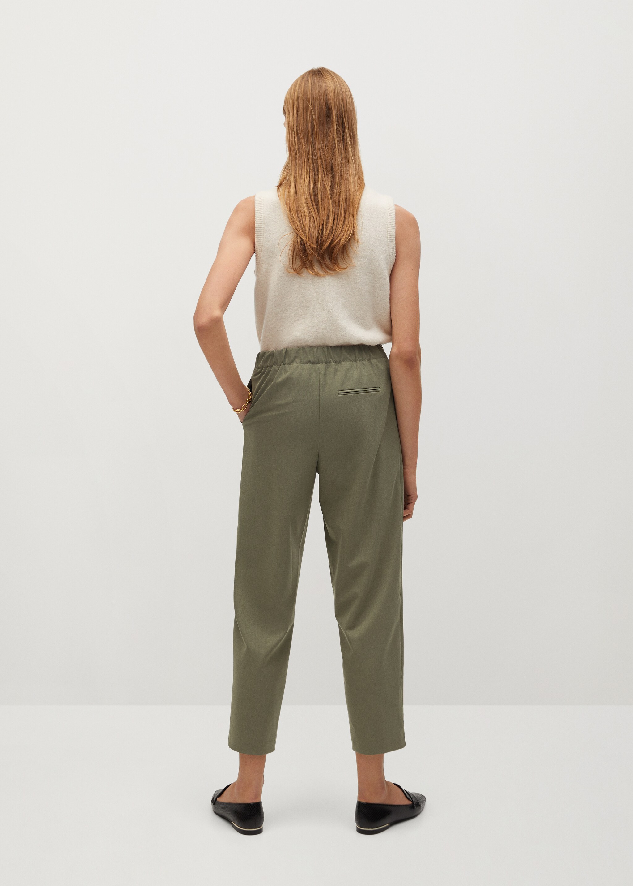Elastic waist pants - Reverse of the article