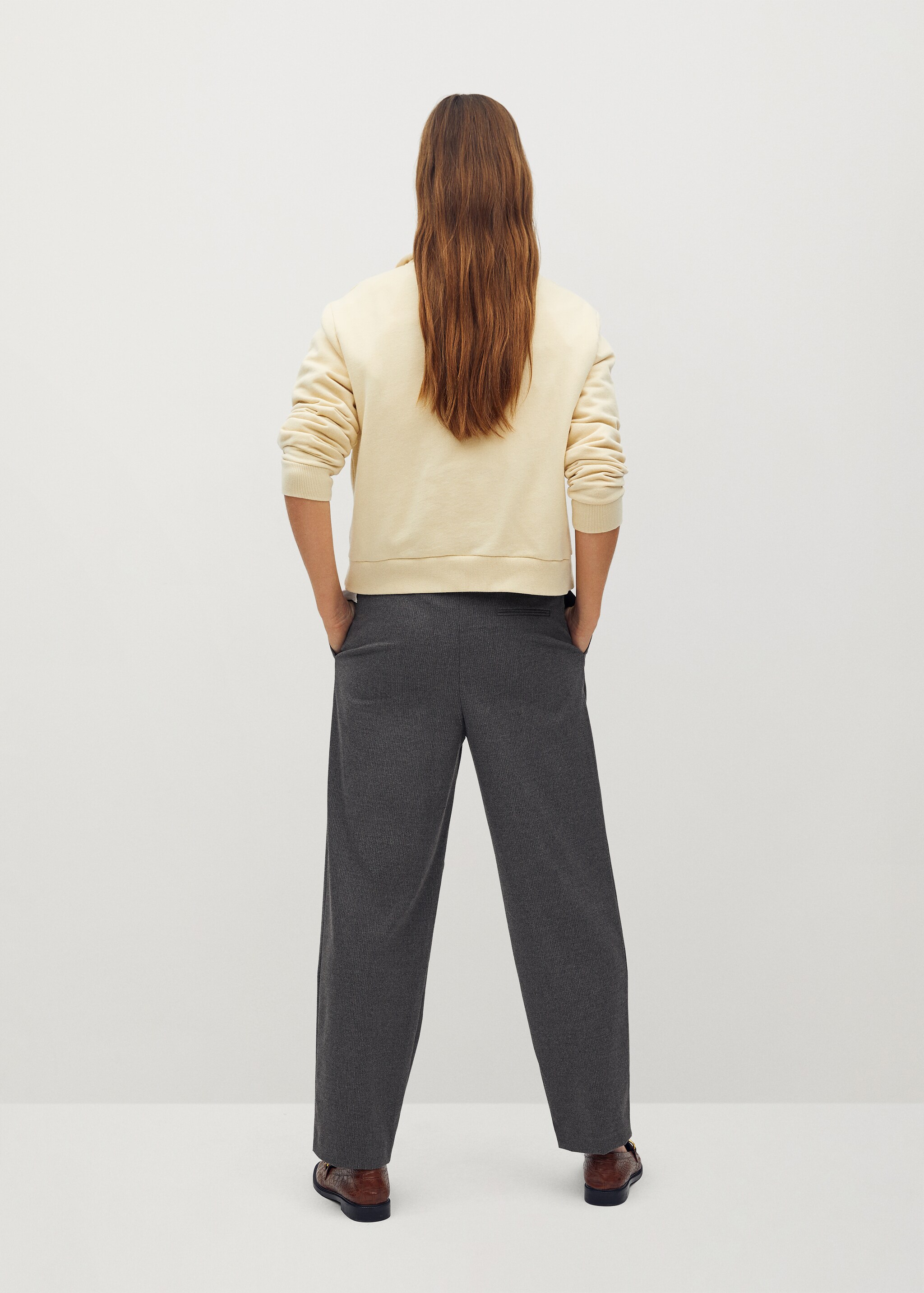 Elastic waist pants - Reverse of the article