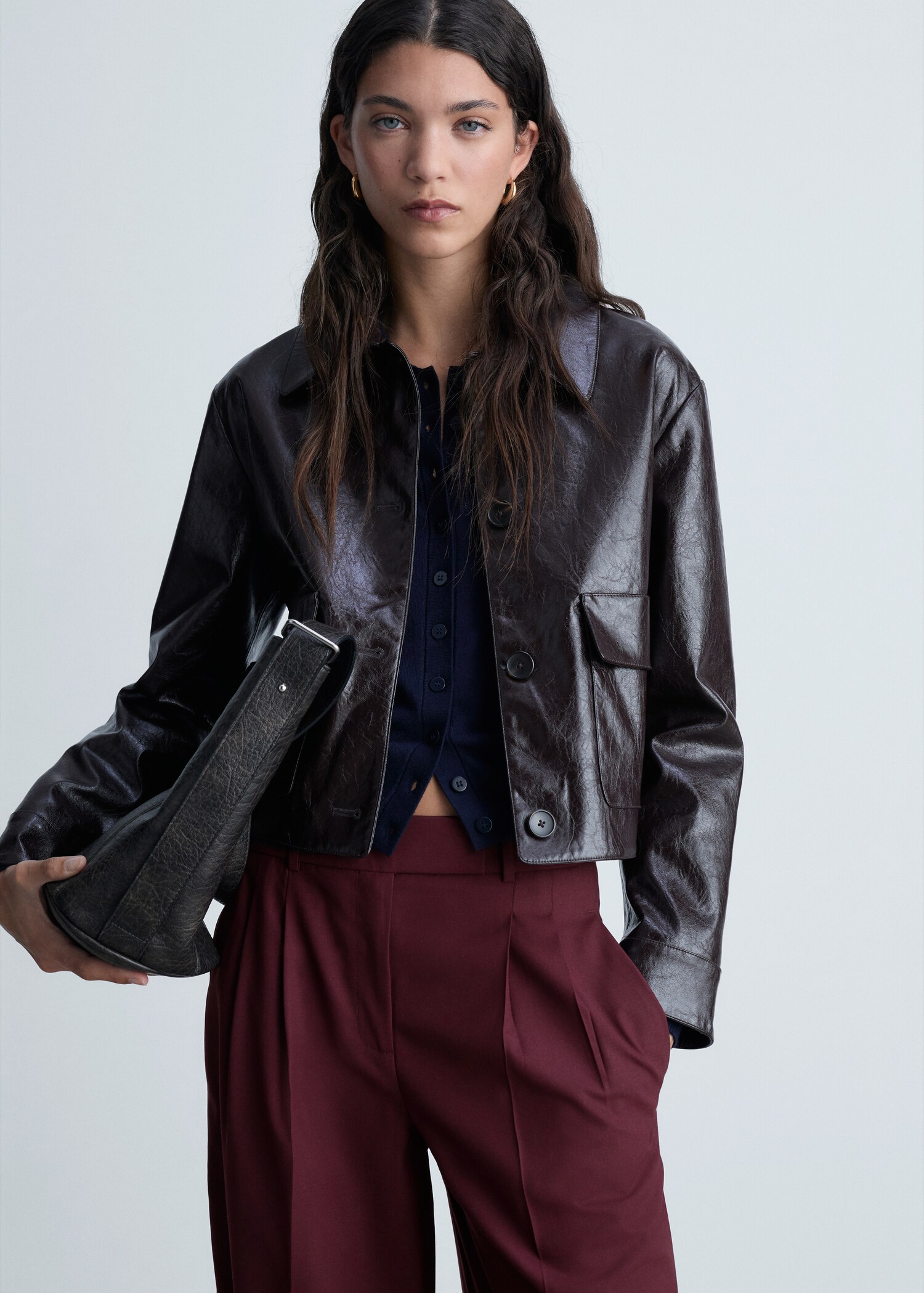 Wide-leg pleated wool trousers - Details of the article 1