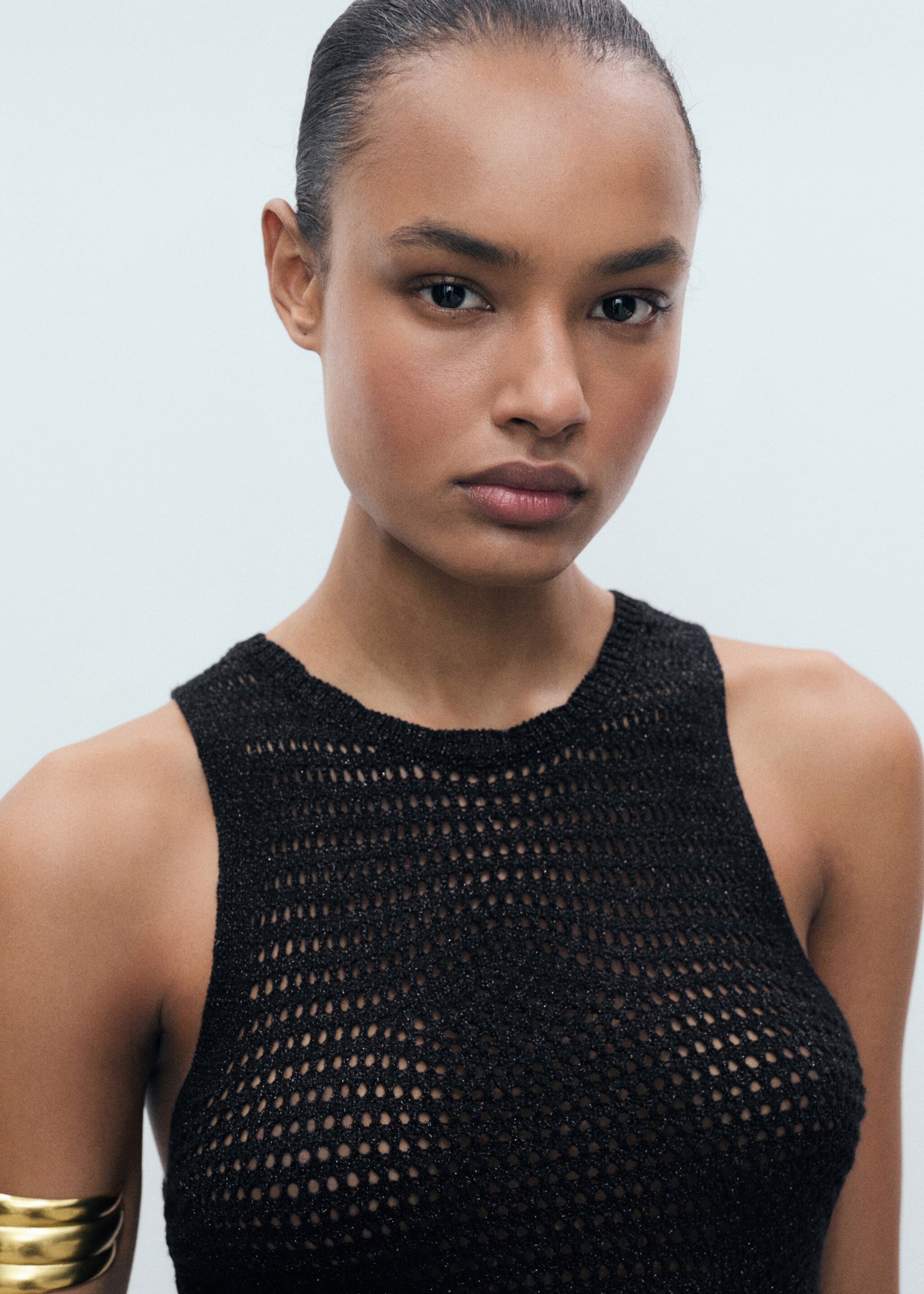 Openwork knitted lurex top - Details of the article 1, Black. Ref: 77020344-00.