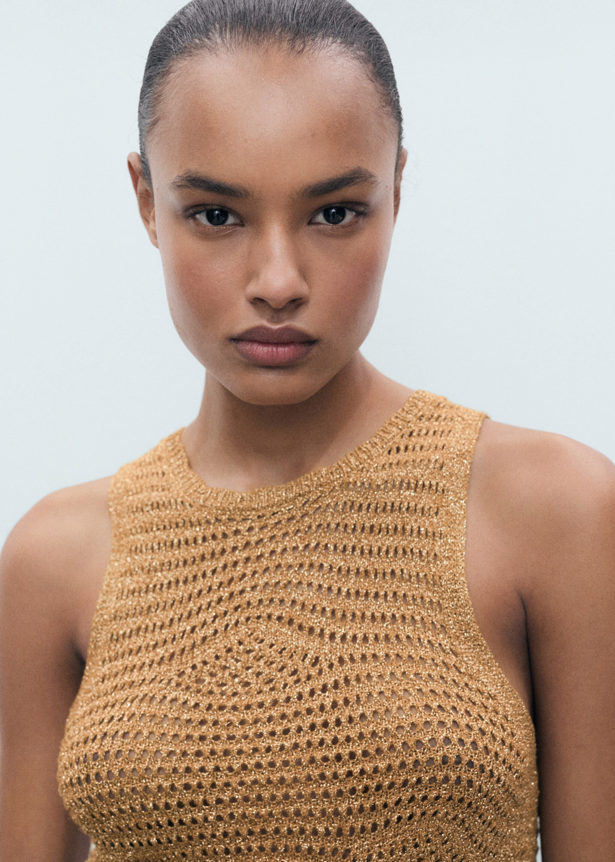 Openwork knitted lurex top - Details of the article 1, Gold. Ref: 77020344-00.