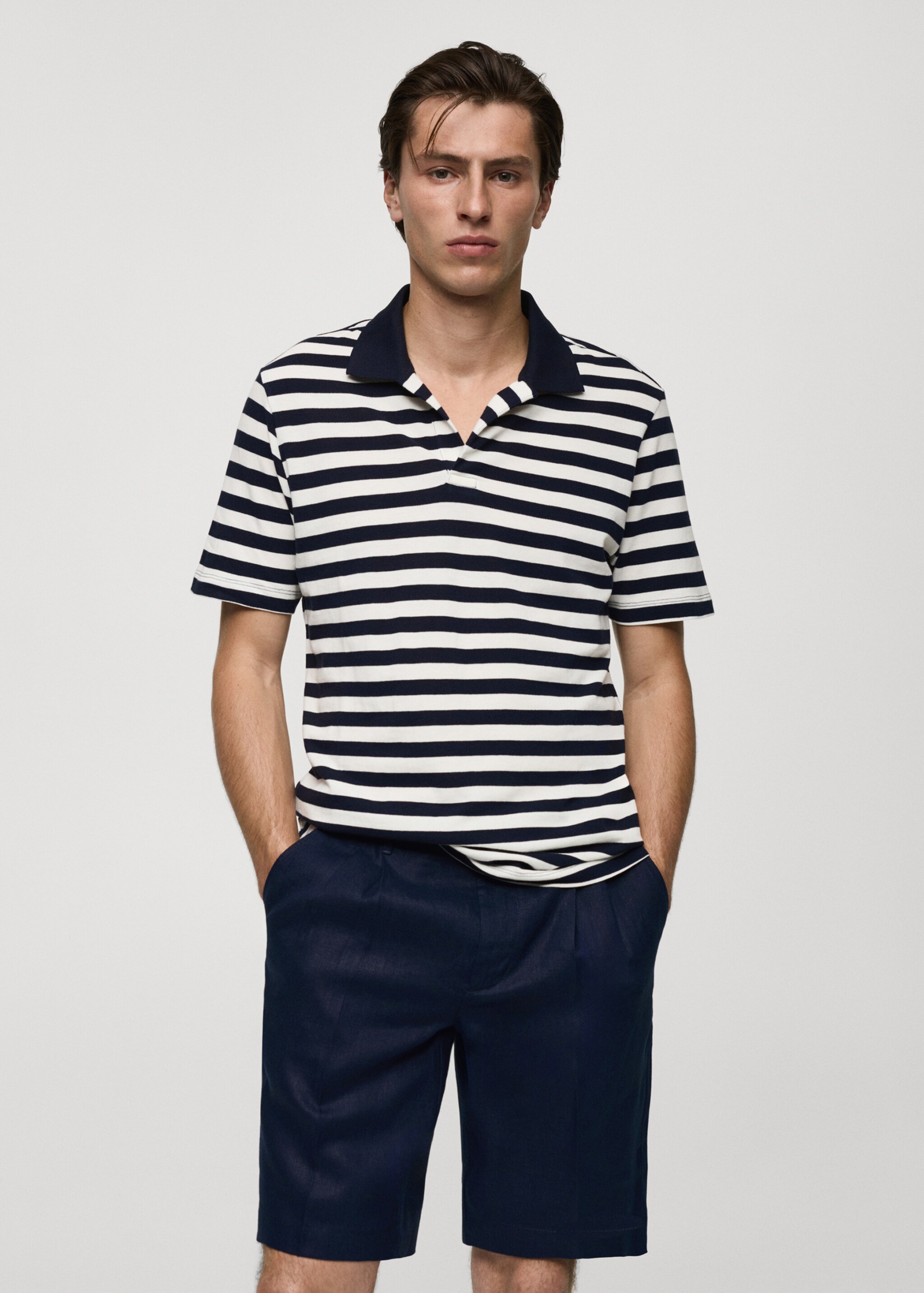 Gestreiftes Regular-Fit-Poloshirt aus Baumwoll-Piqué - Mittlere Ansicht