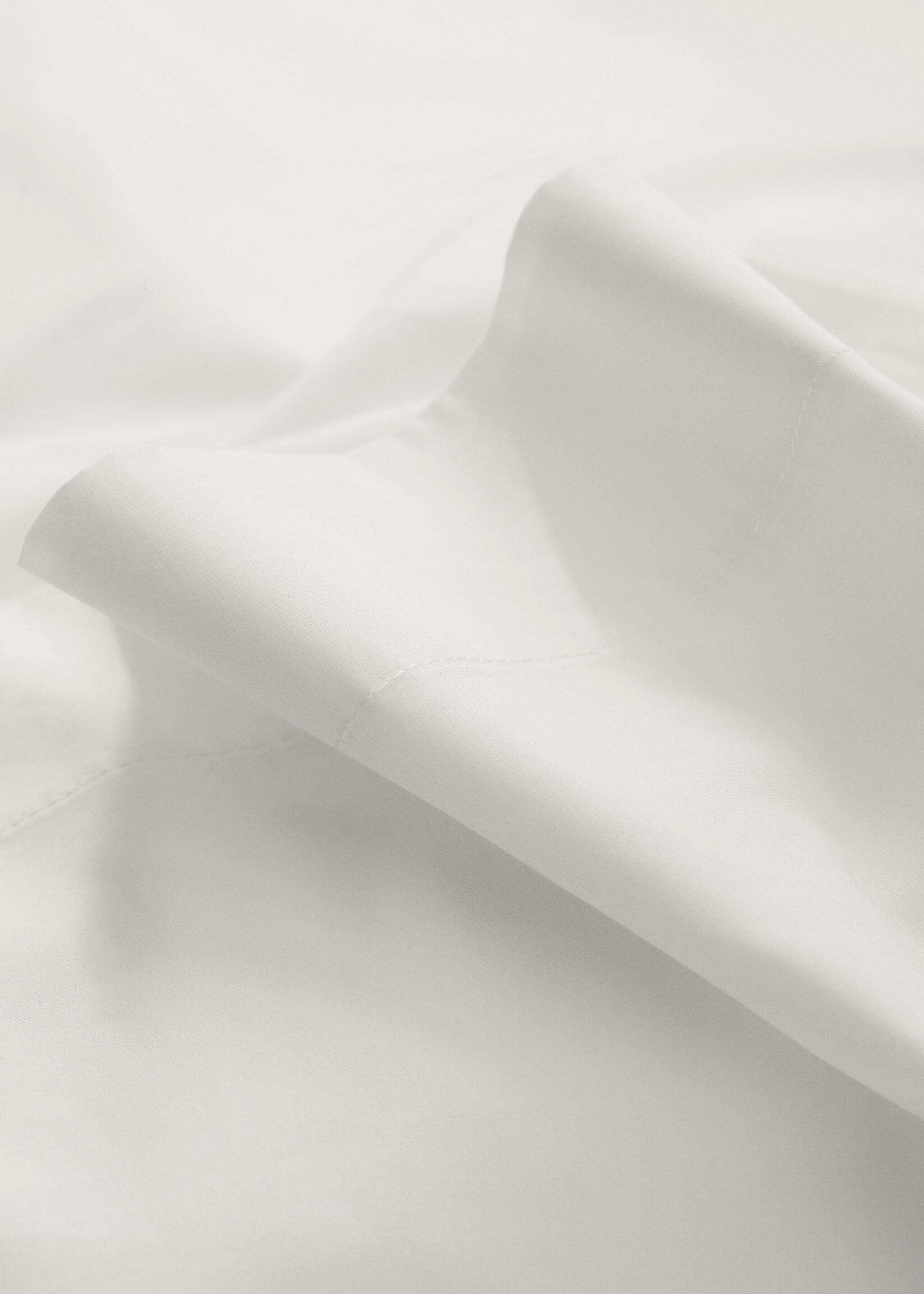 Funda coixinera cotó percala 50x75cm - Detall de l'article 3, Blanc. Ref: 77021013-00.