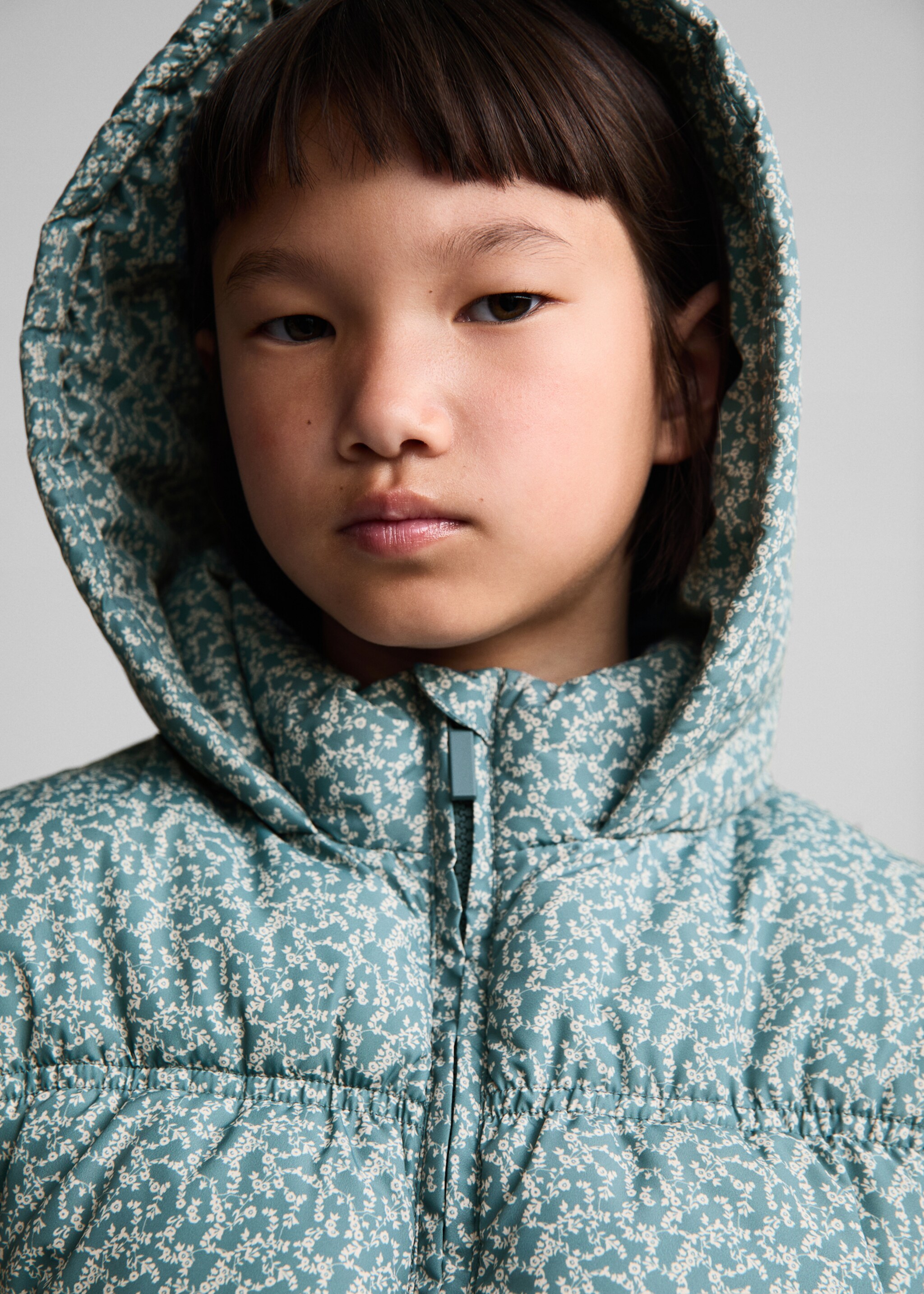 Printed quilted gilet - Details of the article 1, Pastel Green. Ref: 77023270-00.