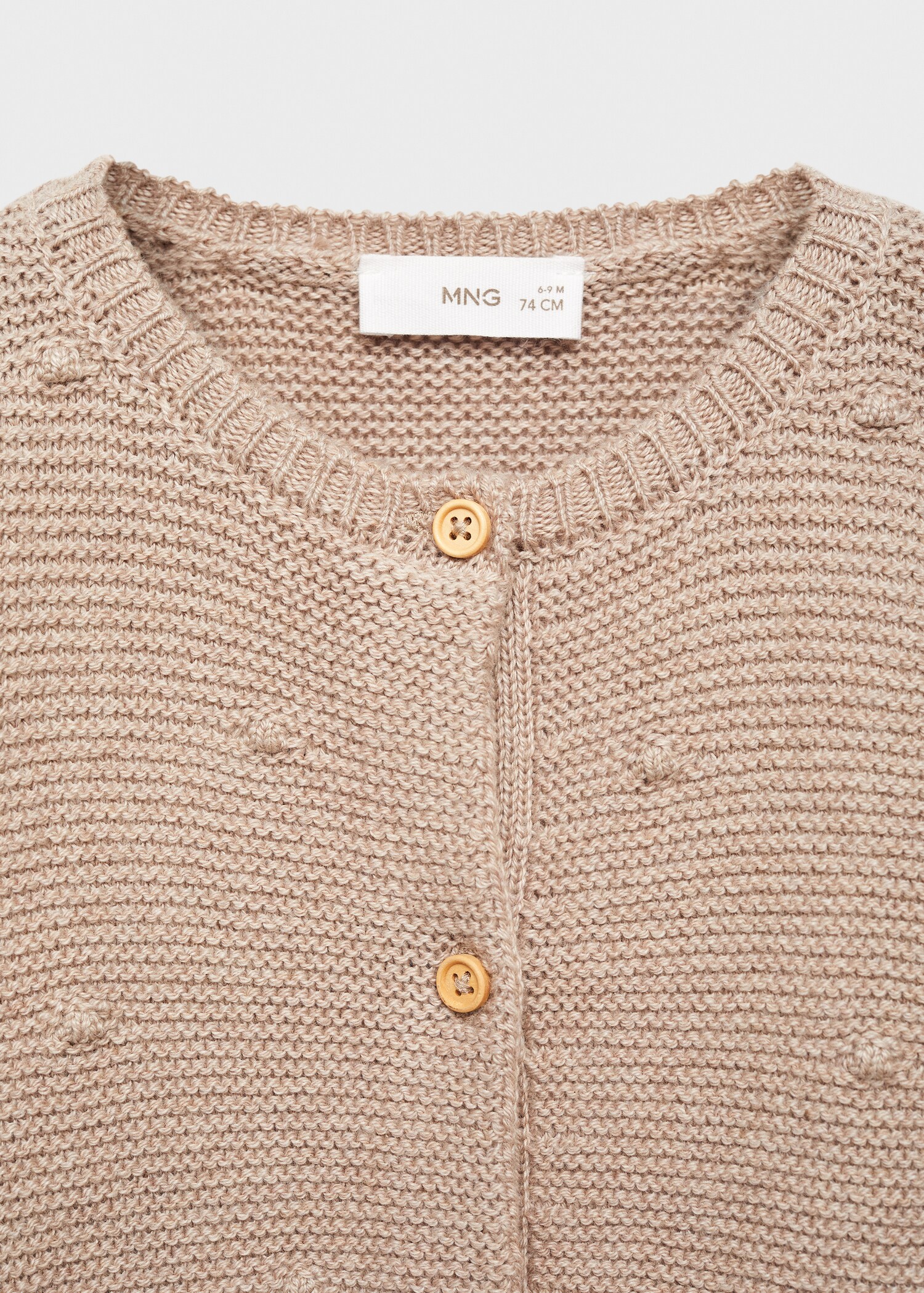 Strickjacke mit Knöpfen - Detail des Artikels 8