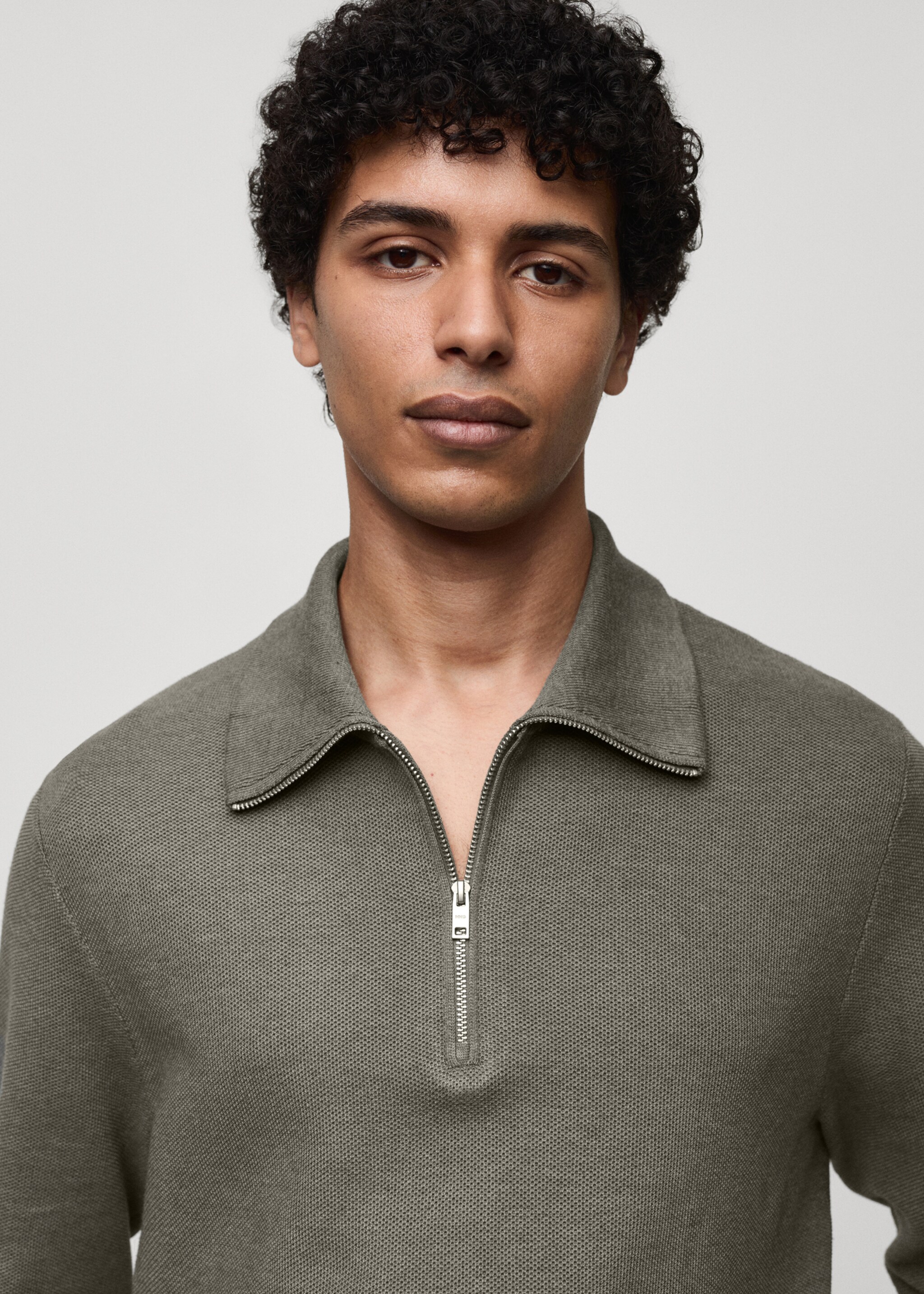 Sweater with polo-neck structure and zip - Details of the article 1, Olive Green. Ref: 77024448-00.