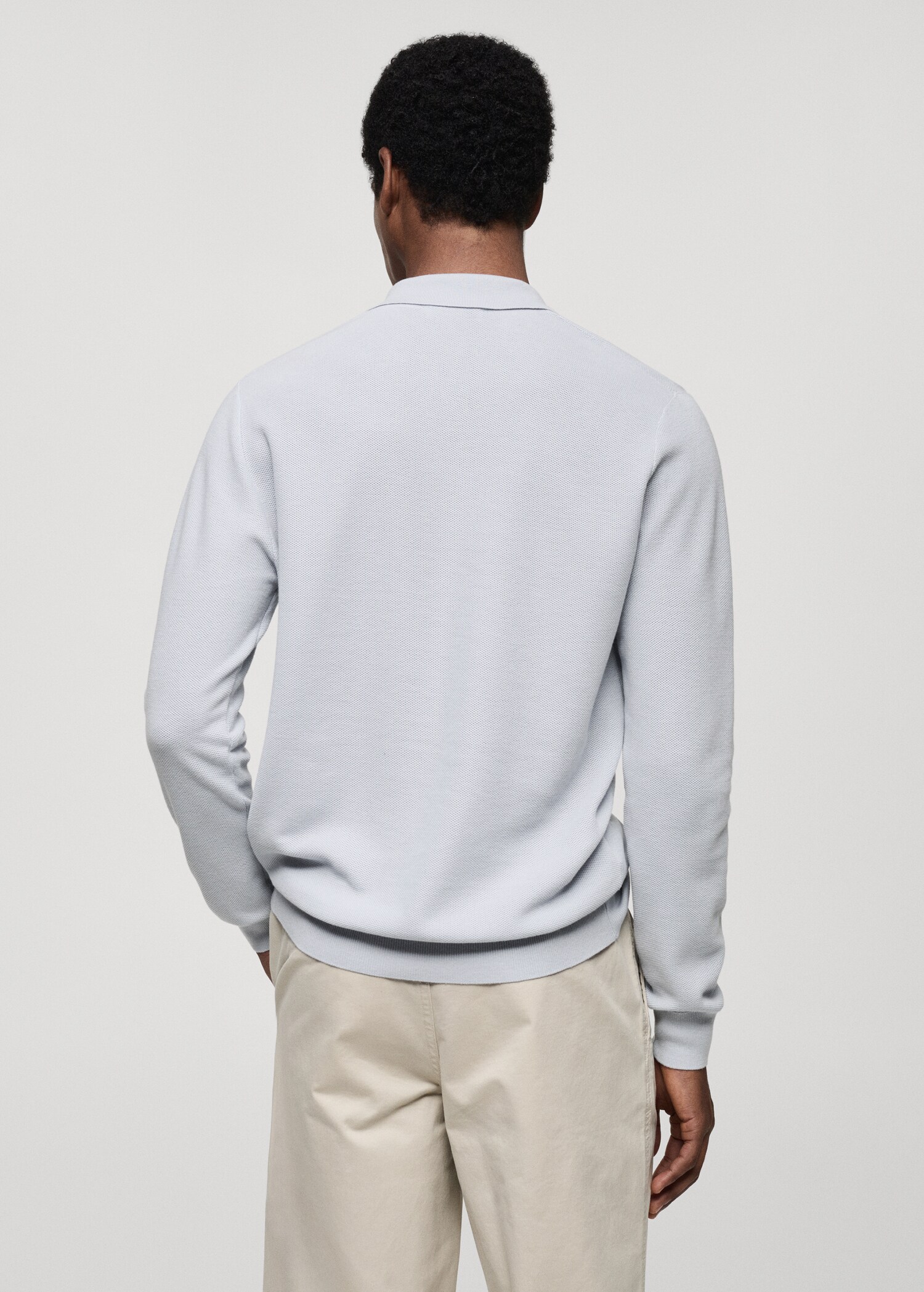 Knitted structured polo sweater - Reverse of the article