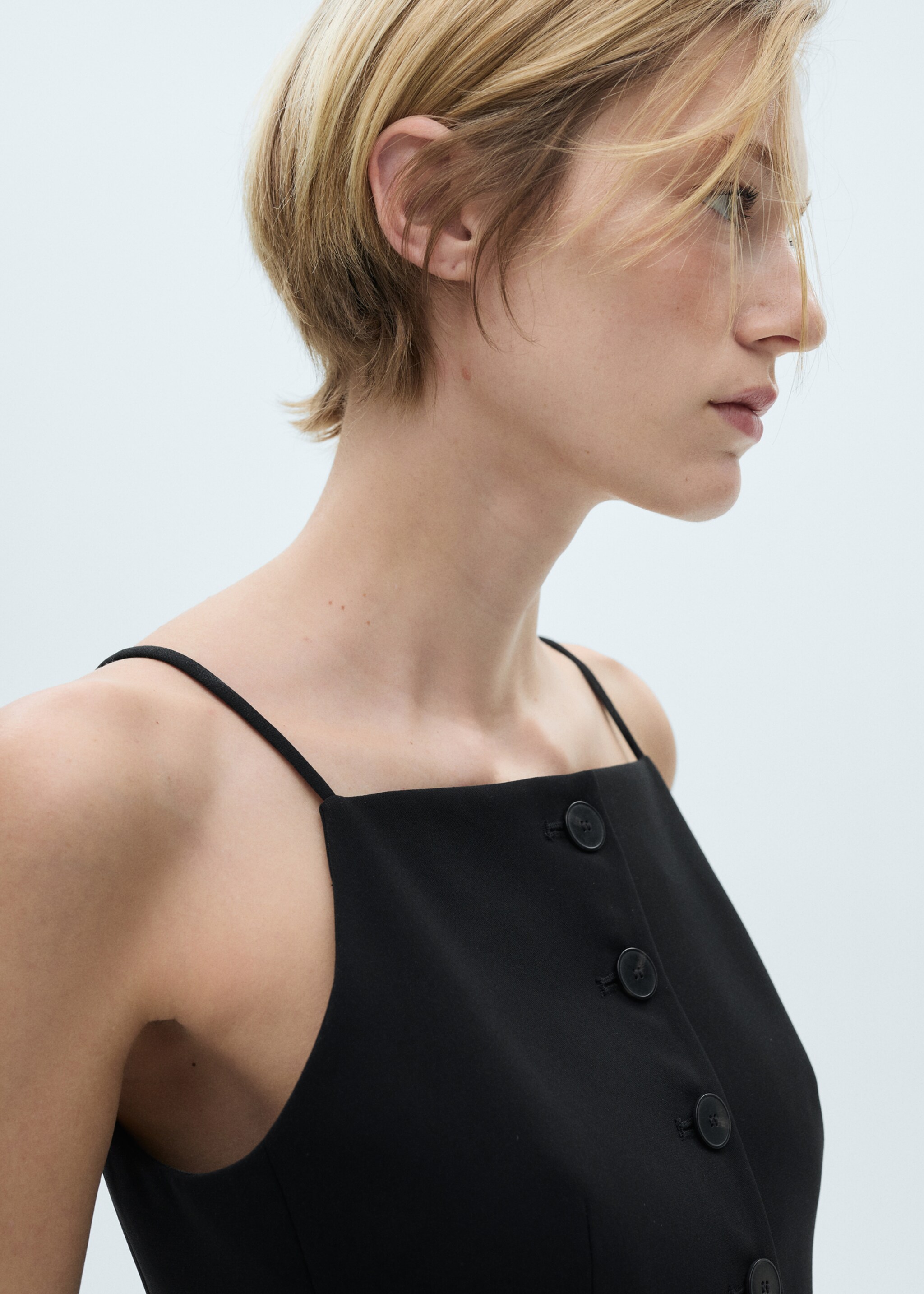 Halter-neck gilet with buttons - Details of the article 1, Black. Ref: 77024767-00.