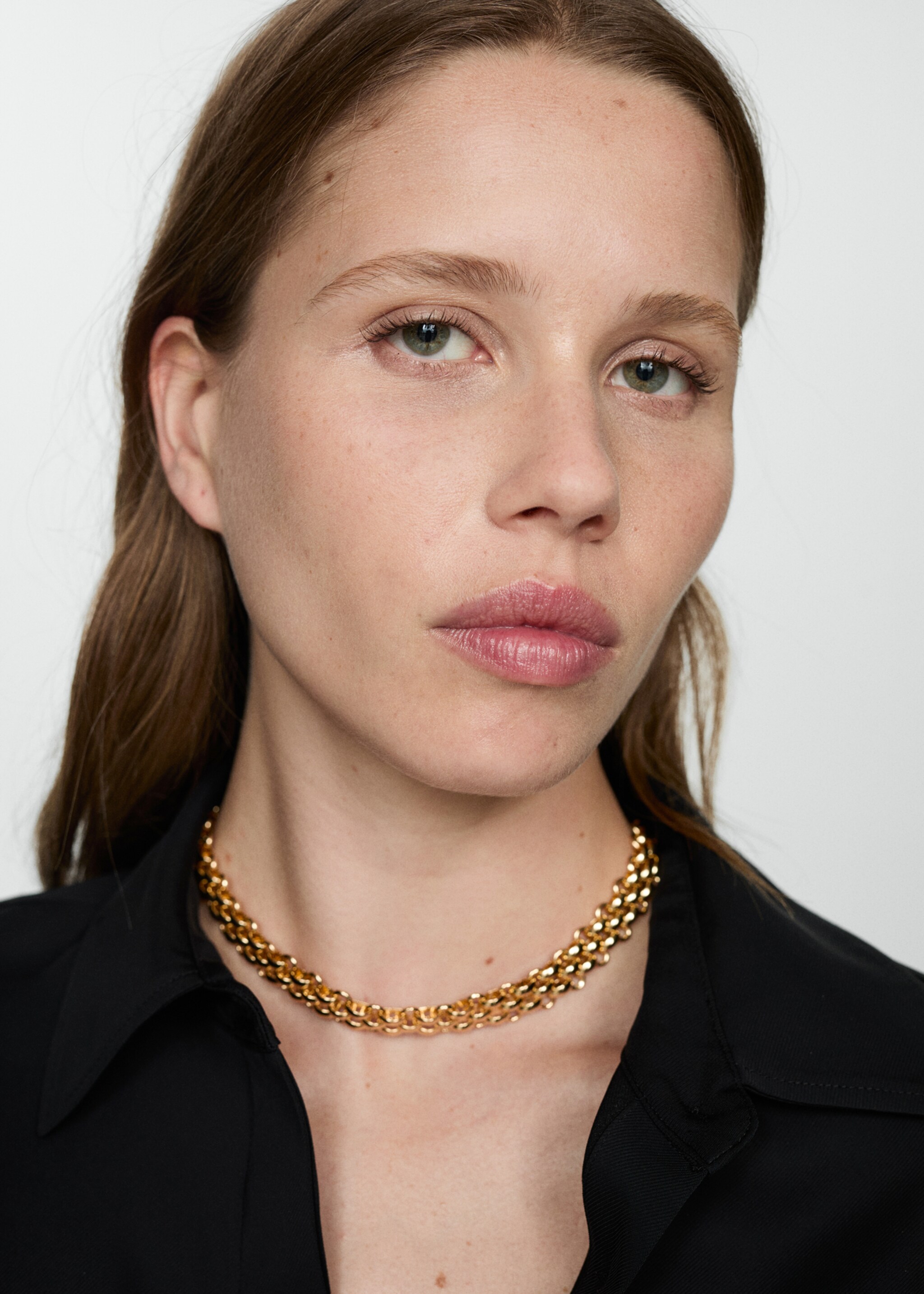 Soepelvallende blouse met lange mouwen - Detail van het artikel 1, Zwart. Ref: 77025649-00.