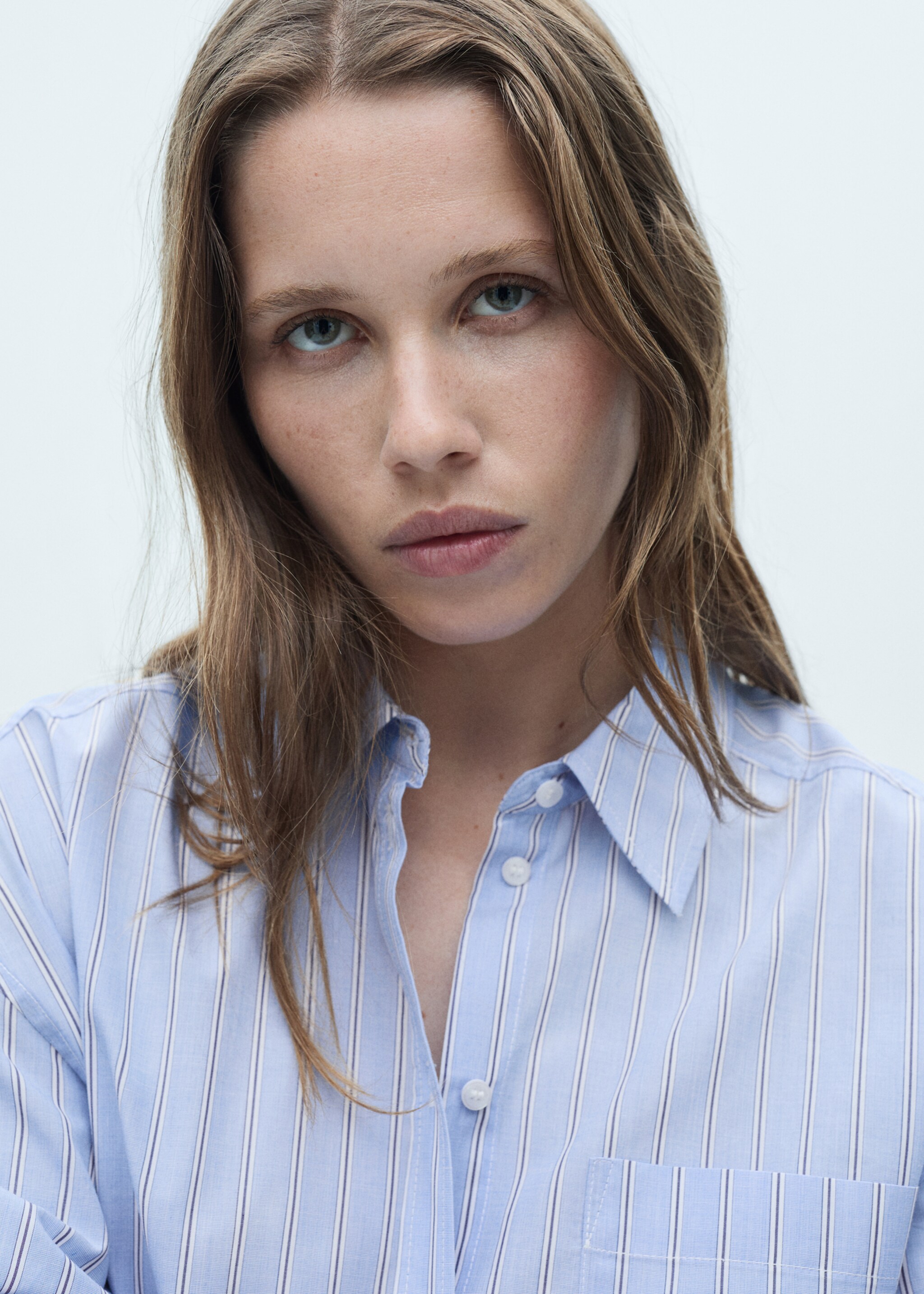 Shirt with contrasting stripes - Details of the article 1, Sky Blue. Ref: 77025650-00.
