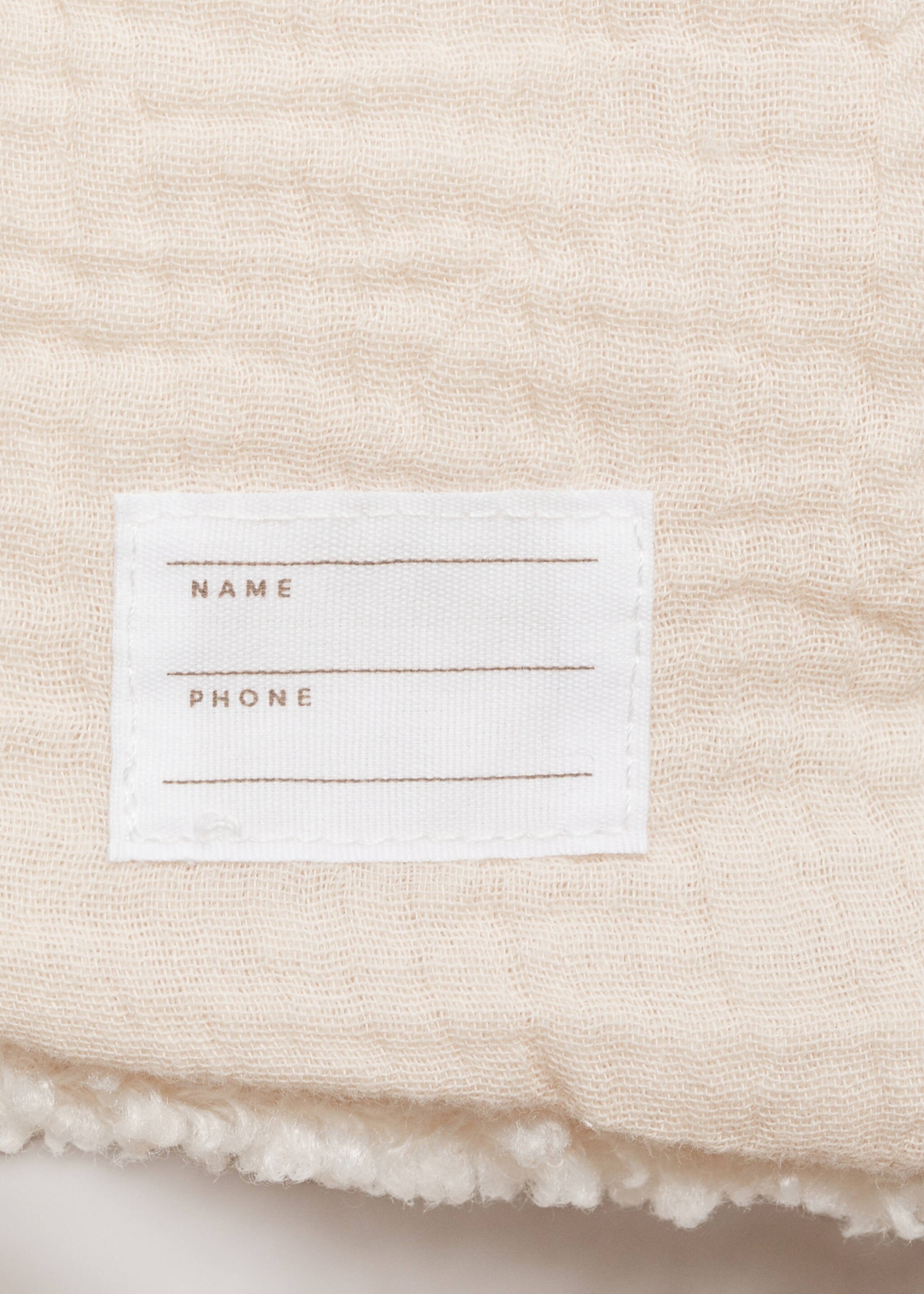 Abric borreguet caputxa - Detall de l'article 0, Blanc trencat. Ref: 77026740-00.