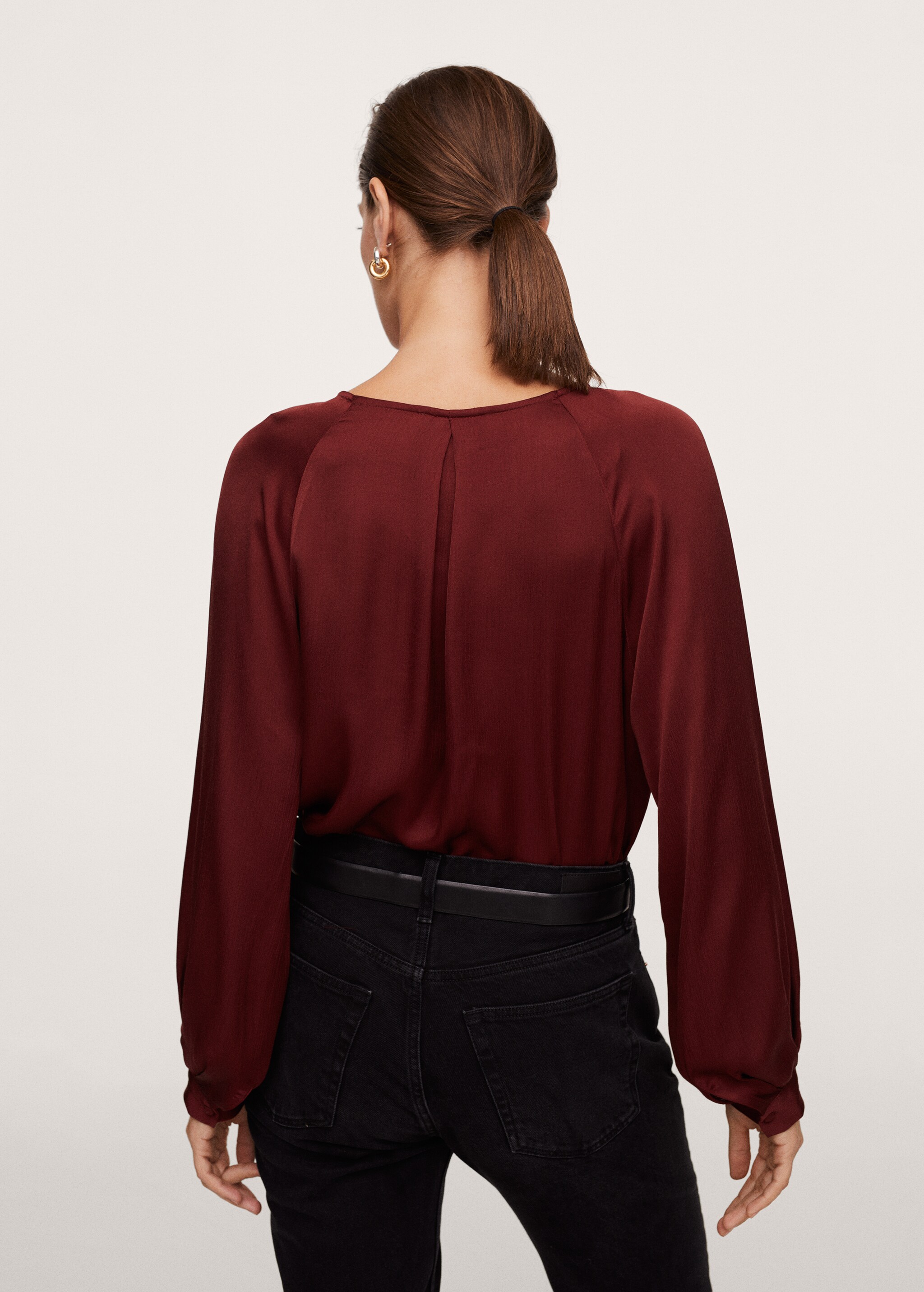 Blusa satinada  - Reverso del artículo