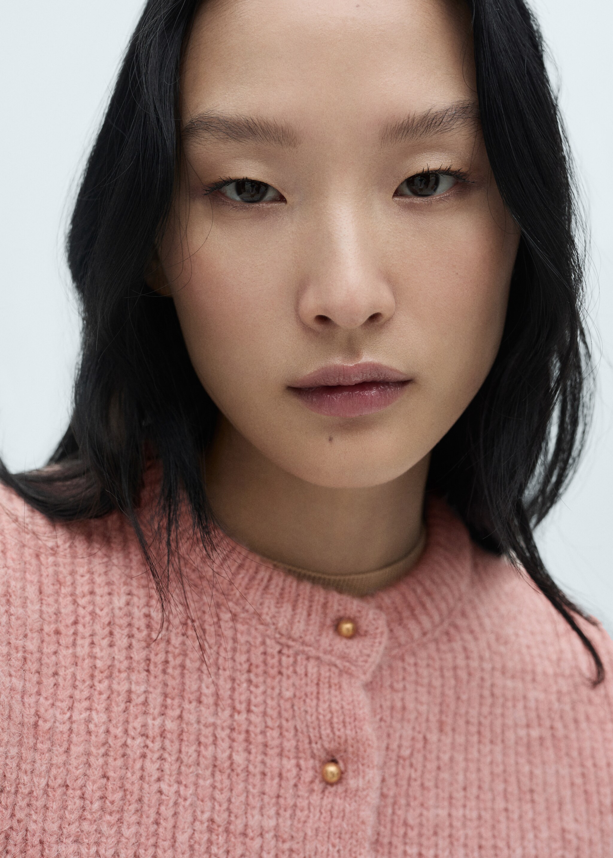 Knitted cardigan with jewel button - Details of the article 1, Pale Pink. Ref: 77029071-00.