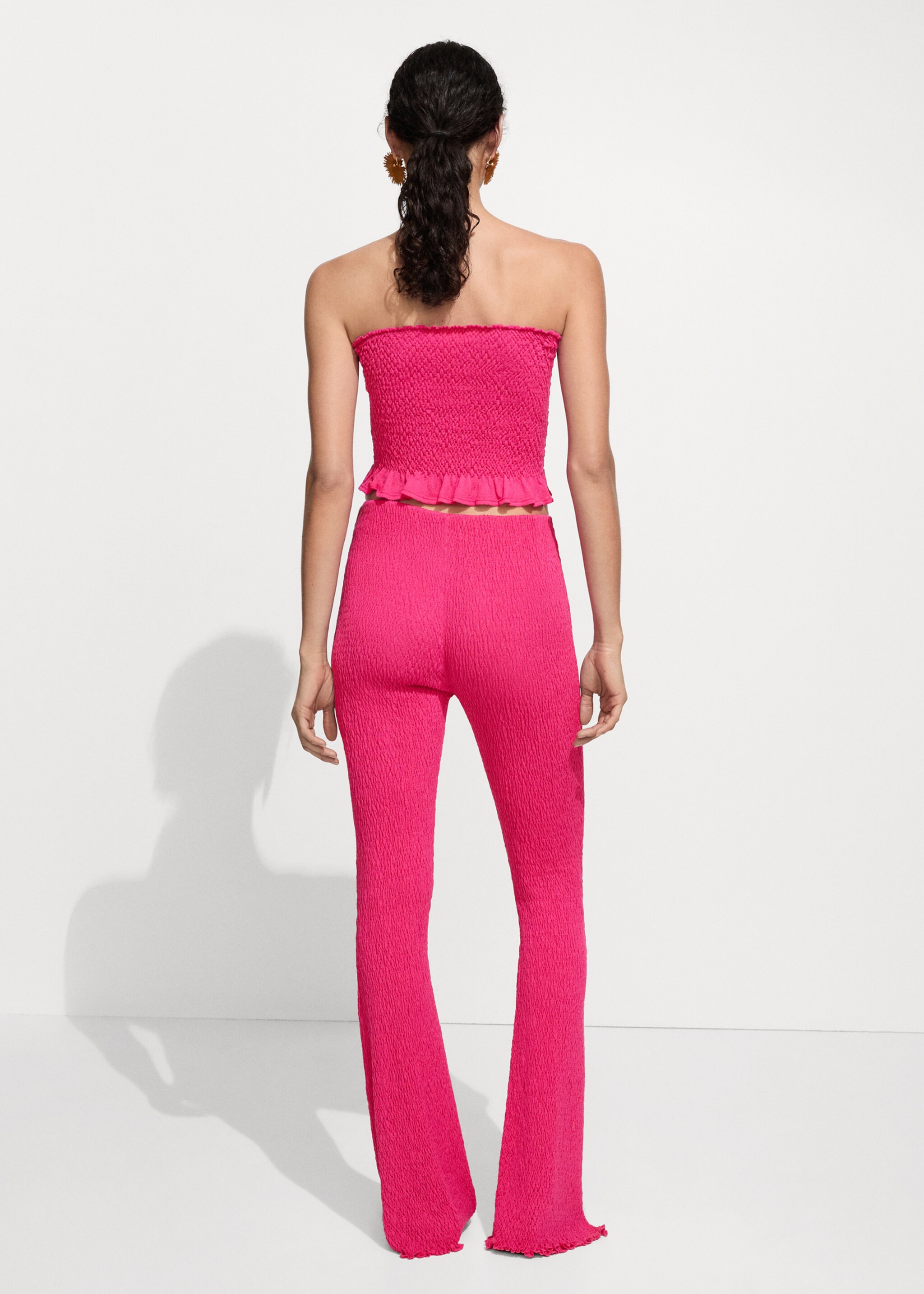 Braided knitted trousers - Reverse of the article, Fuchsia. Ref: 77030380-00.