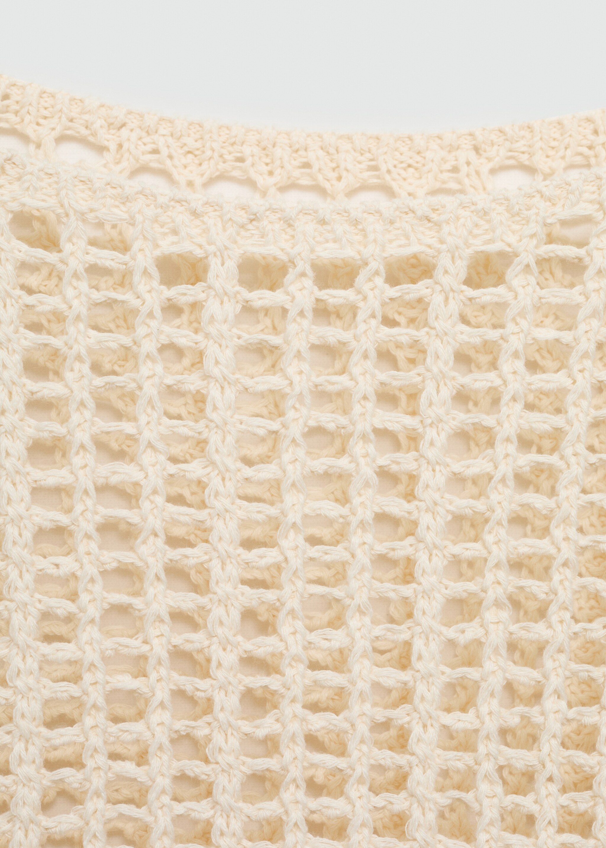 Openwork knitted sweater with fringes - Details of the article 0