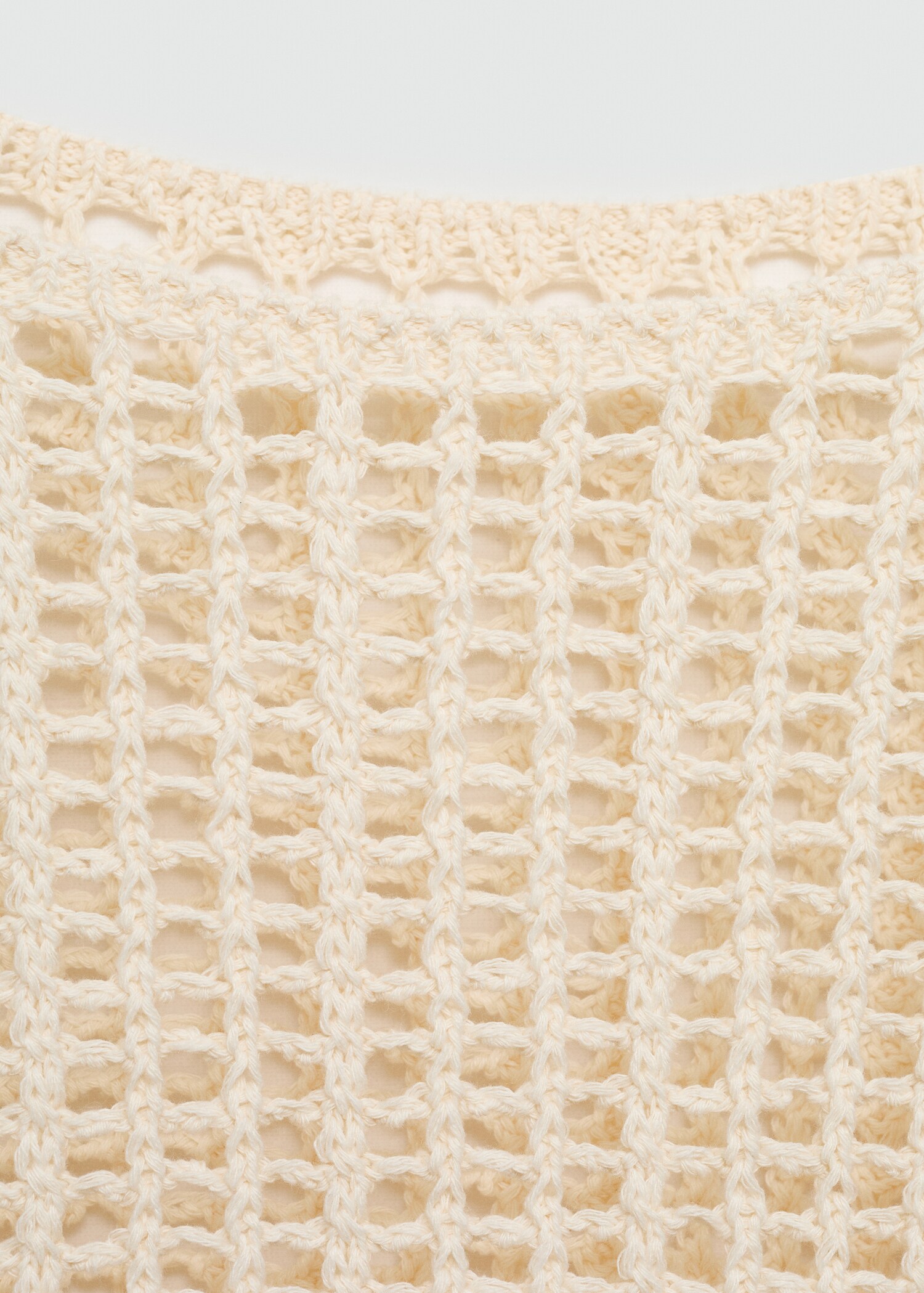 Openwork knitted sweater with fringes - Details of the article 0