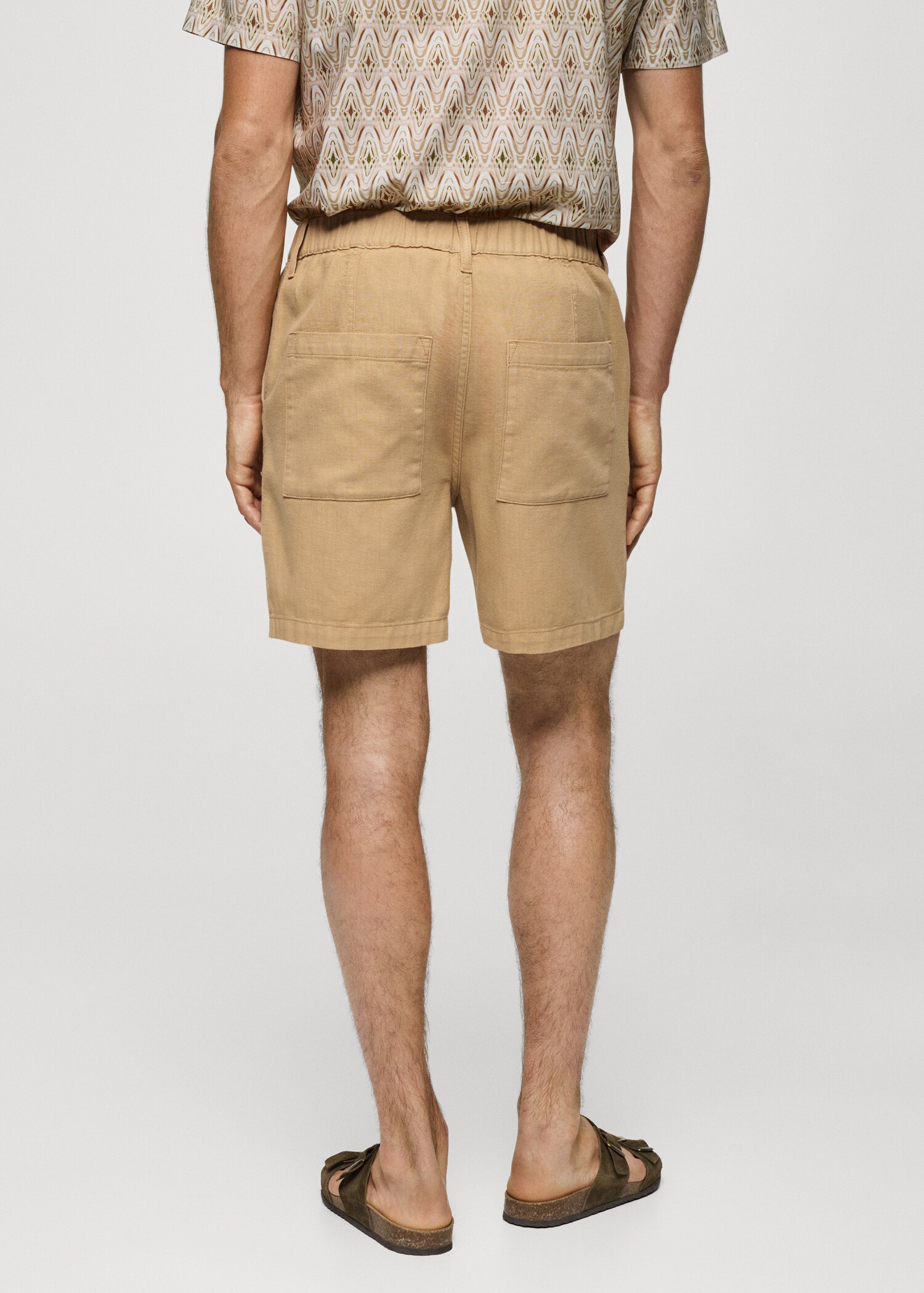 Pockets cotton Bermuda shorts - Reverse of the article