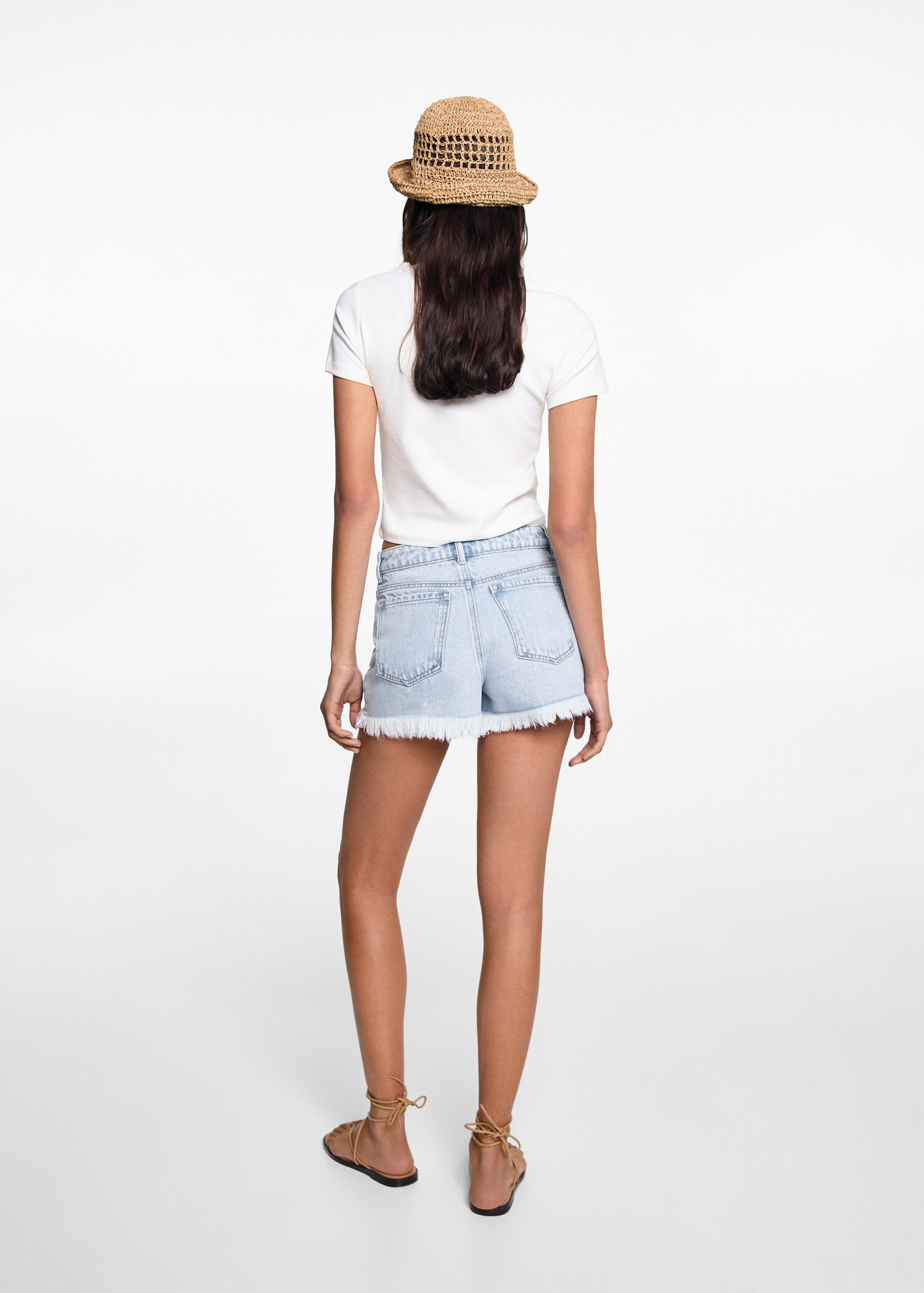 Denim shorts with frayed hem - Reverse of the article
